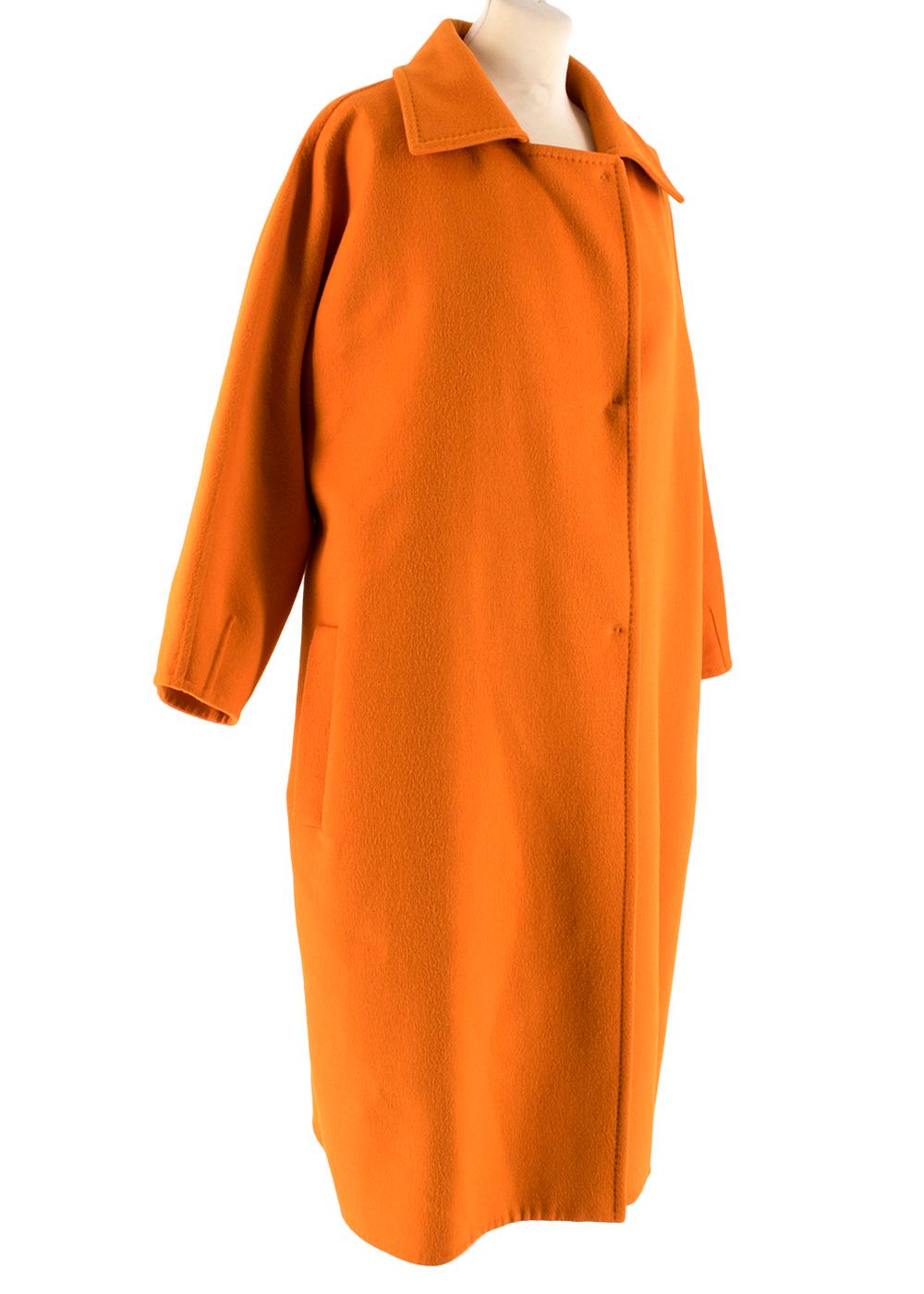 Max Mara Orange Wool Coat

- Snap button front closure 
- folded collar 
- Long sleeves 
- Two Side Slip Pockets 
- Straight Hemline 

Materials 
60% Wool 
30% Angora 
10% Cashgora 

Dry Clean Only

Made in Italy 

Please note, these items are