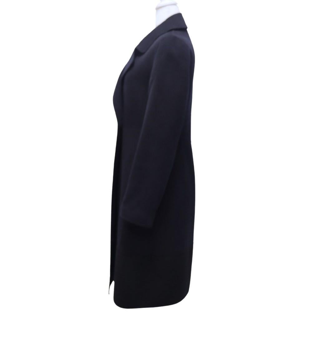 Max Mara Studio Navy Wool Below the Knee Midi Coat, double faced and lapel collar.

Material: 90% Wool / 10% Cashmere
Size: EU 38
Measurements
Bust: 93m
Waist: 80cm
Hips: 110cm
Condition: Excellent