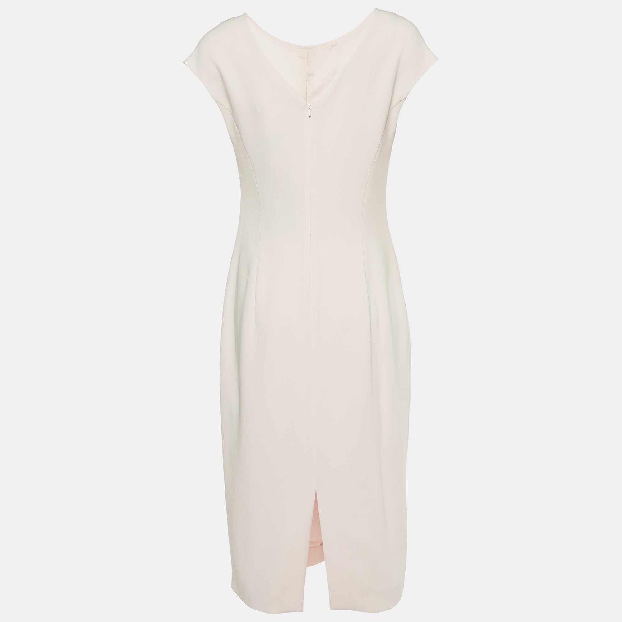 Masterful tailoring and timeless appeal characterize this dress from the house of Max Mara Studio. Presented in pink, it is nothing but pure charm and is a must-have.