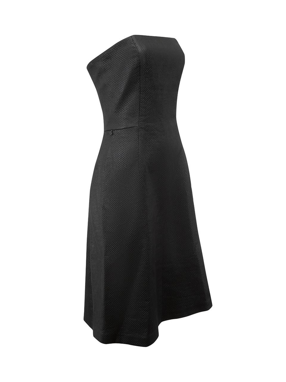 CONDITION is Very good. Hardly any visible wear to dress is evident. Missing belt on this used Max Mara designer resale item.
 
Details
Vintage
Black
Polyester
Mini dress
Textured
Strapless
Back zip closure with hook and eye

Made in Italy
