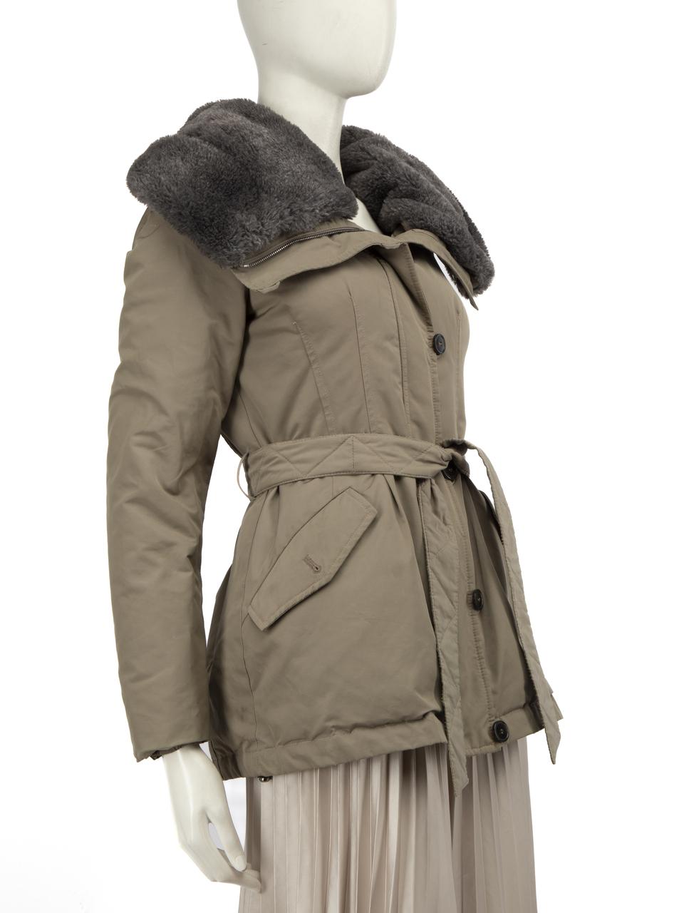 CONDITION is Good. General wear to the coat is evident. Marks below the left armpit, the front lower left side, the front lower right side under the pocket, on both cuffs, the back right sleeve and the side of the left sleeve. Plucks to the weave on