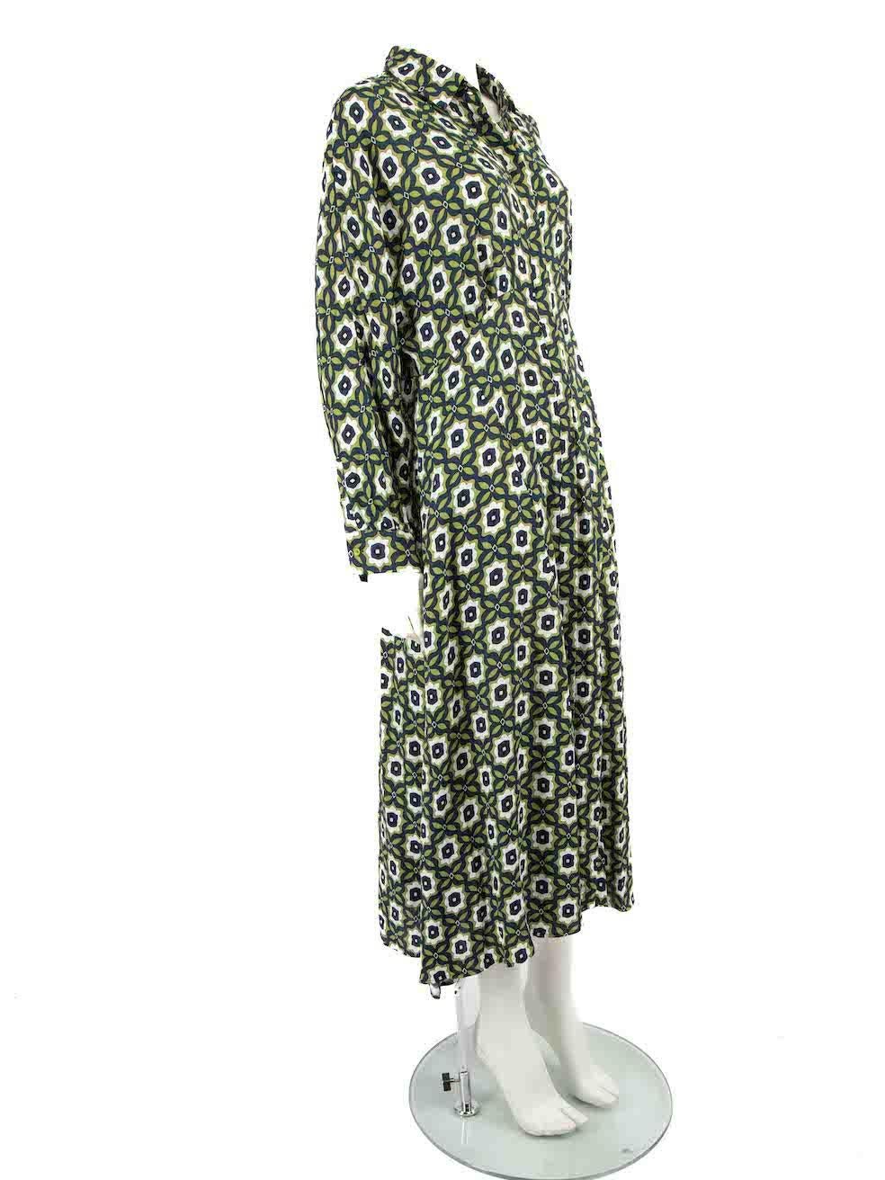 CONDITION is Very good. Hardly any visible wear to dress is evident on this used Max Mara Weekend designer resale item.
 
 
 
 Details
 
 
 Model: Tacco Day Dress
 
 Green
 
 Viscose
 
 Shirt dress
 
 Abstract floral pattern
 
 Midi
 
 Button up