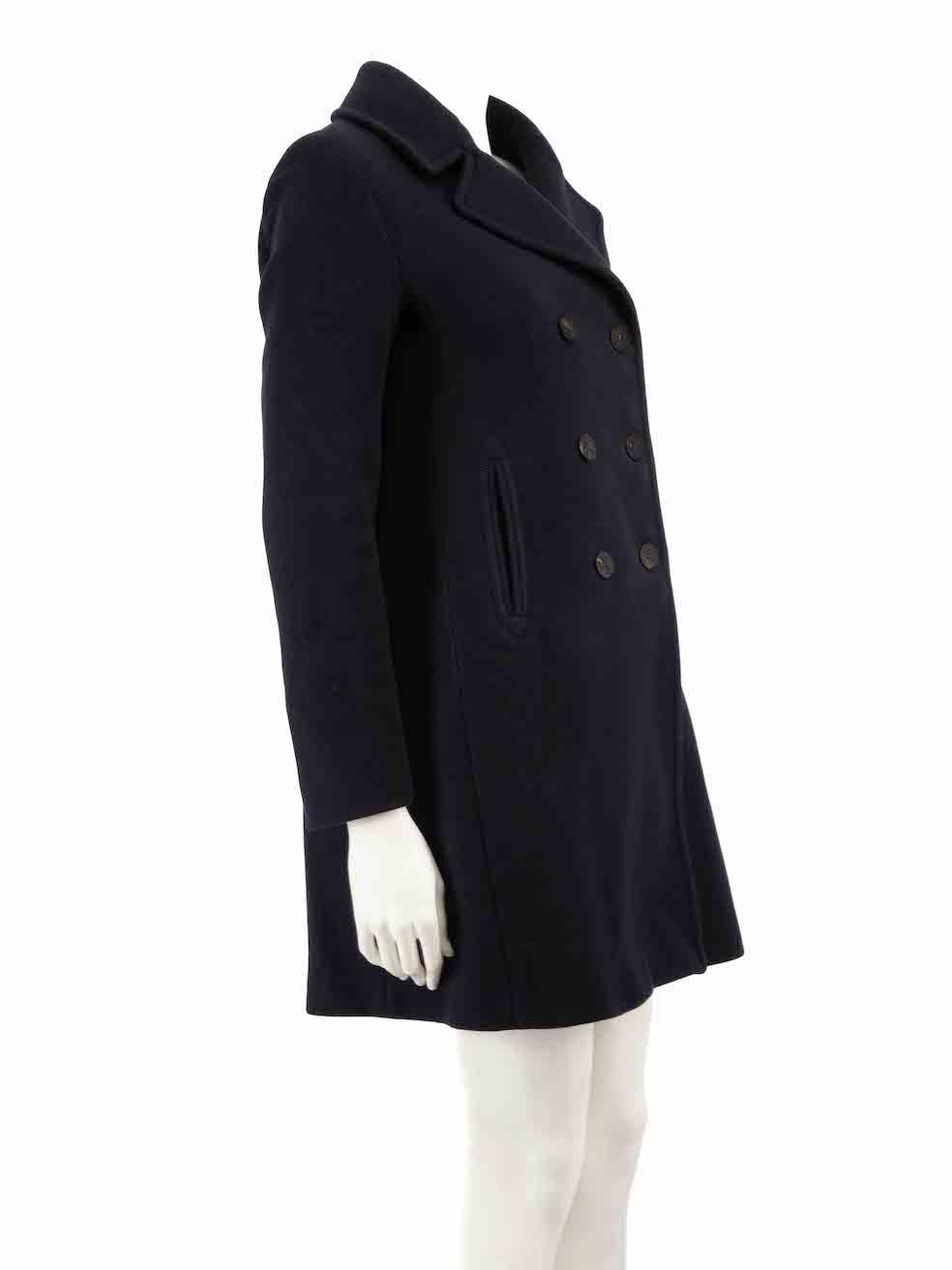 CONDITION is Very good. Hardly any visible wear to coat is evident on this used Weekend Max Mara designer resale item.
 
 
 
 Details
 
 
 Navy
 
 Wool
 
 Mid length coat
 
 Double breasted
 
 2x Front side pockets
 
 
 
 
 
 Composition
 
 UNCLEAR