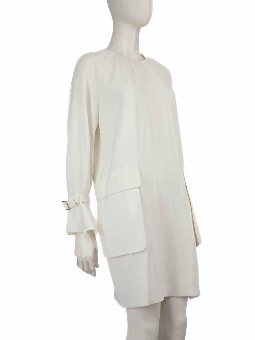 CONDITION is Good. Minor wear to the dress is evident. Light discolouration around the neckline, front centre, left pocket, right cuff, front hemline, top rear, around rear hemline. Loose thread to the interior front hemline on this used Max Mara