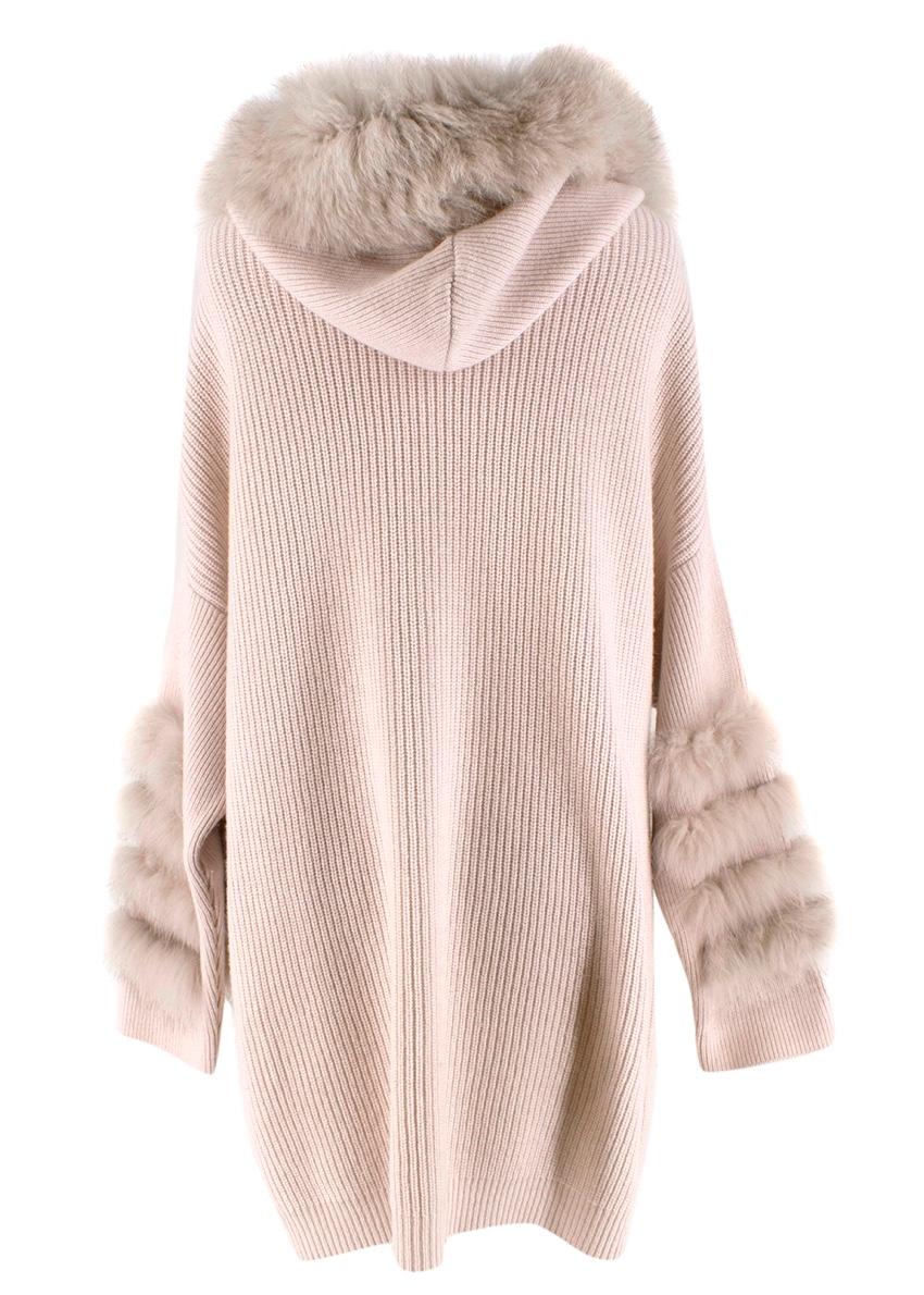 Max & Moi Beige Cashmere Blend Fur Trimmed Knit Hooded Cardigan

-Made of a soft wool and cashmere blend 
-Luxurious fox fur trim to the wood and details to the sleeves 
-Classic long cut 
-Pockets to the front 
-Ribbed hem 
-Branded zip fastening