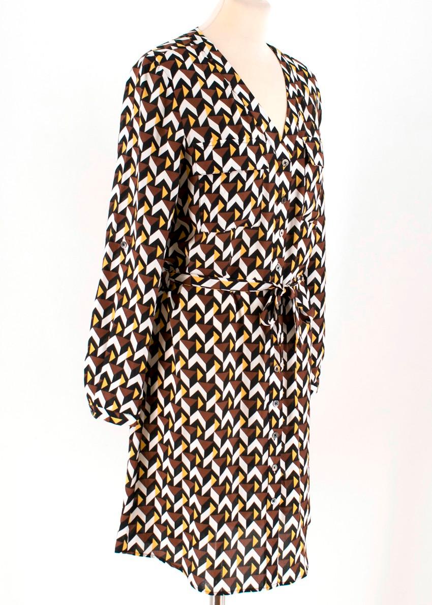 Max & Moi Geometric Print Silk Dress
 
 - Multi-coloured silk dress
 - Lightweight
 - Geometric print
 - Long sleeved, adjustable for shorter length
 - Buttoned cuffs
 - V-neck
 - Centre-front button down
 - Breasted flap pockets
 - Belt loops and