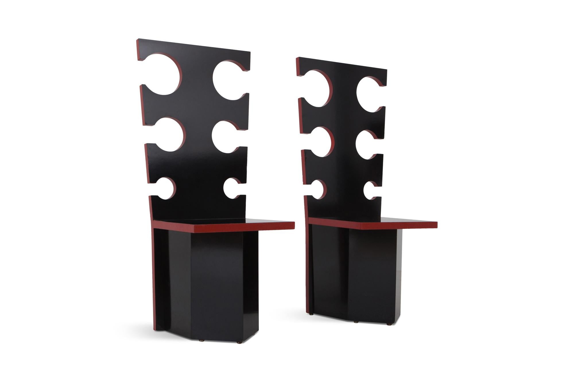 black lacquer with red edges by Max Papiri, functional art, collectible design 
Designed on request by and for the private home of Mario Sabot. The intriguing design shows straight cut-out backrests and rectangular seats on a polygonal base. The