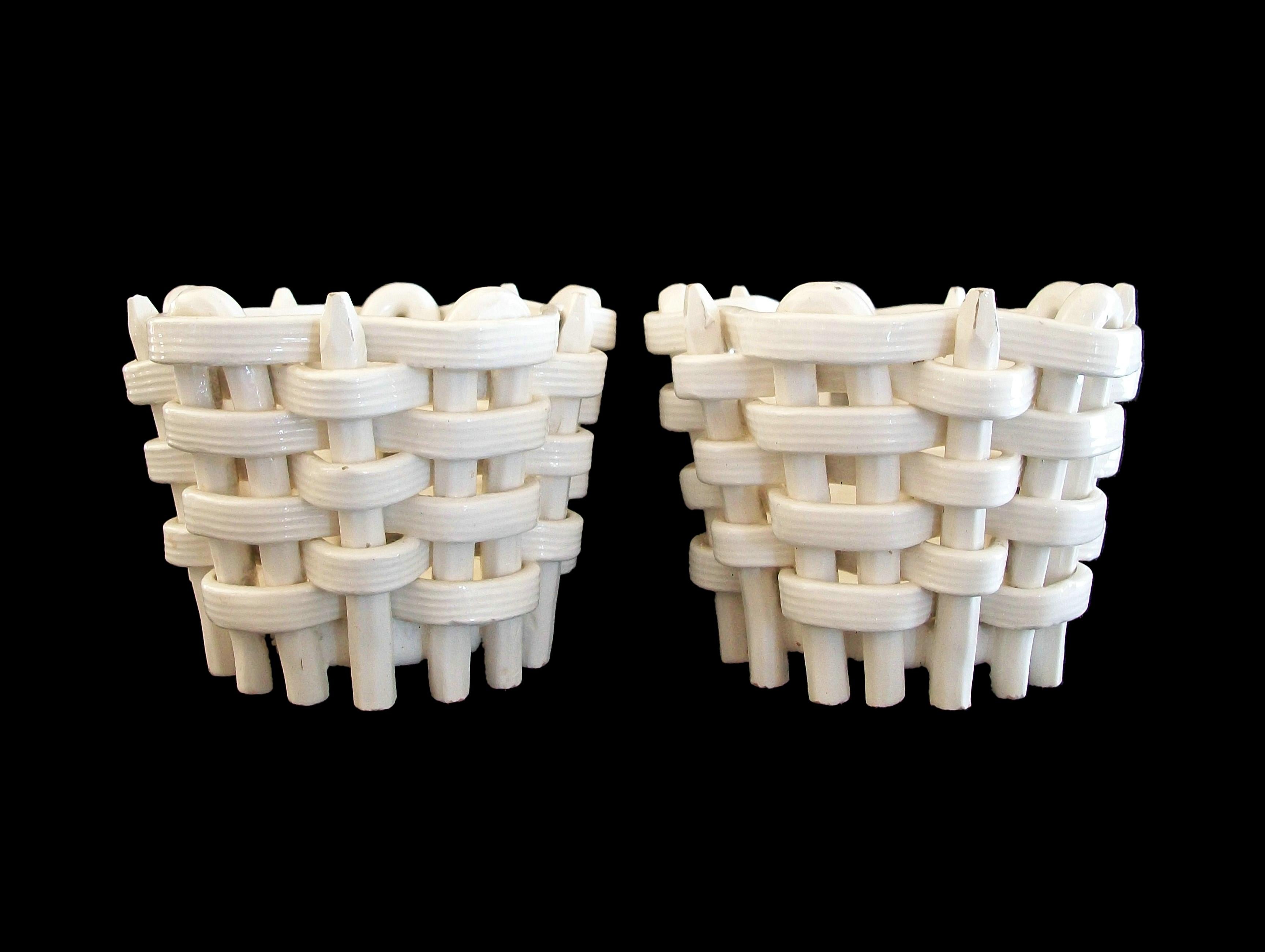 MAX ROESLER (Manufacturer) - Rare pair of basket weave ceramic cachepots / planters - white ceramic body with an over-all clear glaze - signed on the base (impressed mark) - Germany - circa 1910.

Excellent antique condition - chip to one support -