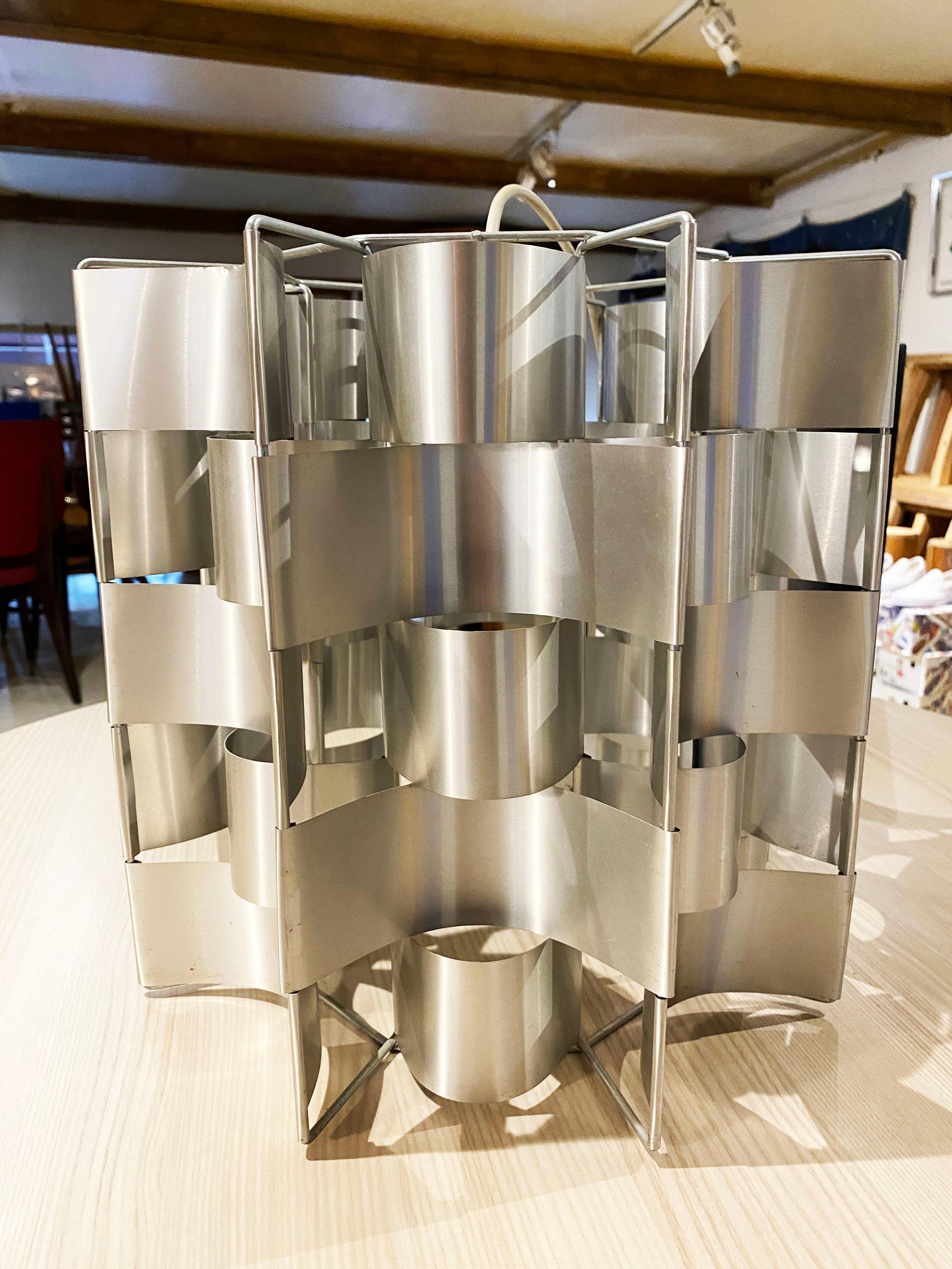 Max Sauze aluminum chandelier, 1975
Measures: 32 x 34.