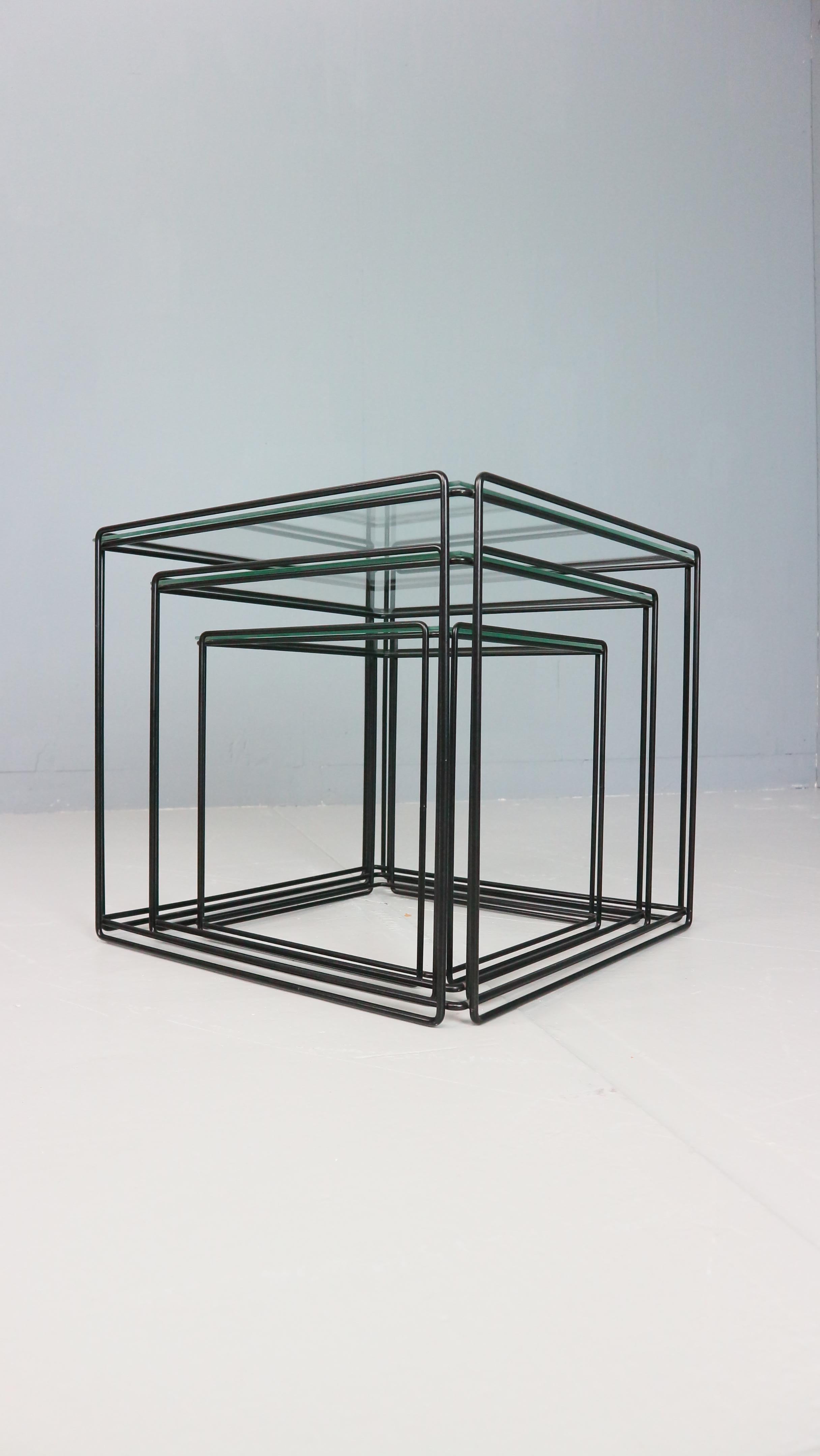 Complete set of three nesting tables designed by French artist Max Sauze and produced by Groupe S.A France,circa 1970.
The structure is made of black steel rod and all tables have new glass. 

Please contact us for the best shipping options and