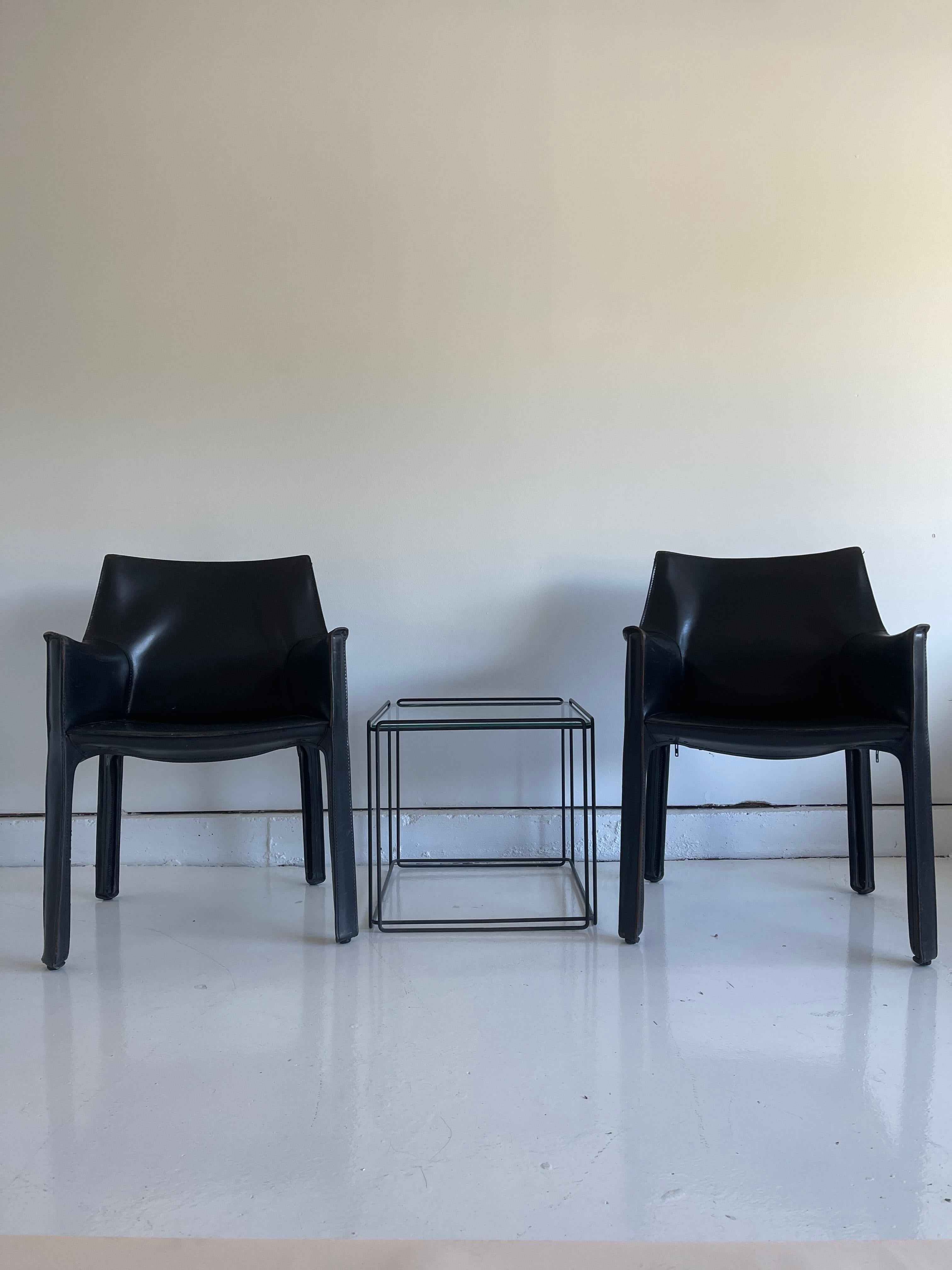 Pair of Max Sauze Isosceles tables for Arrow, France 1970s. Black metal wire-frame with glass inserts. Striking minimalist design works with any decor.