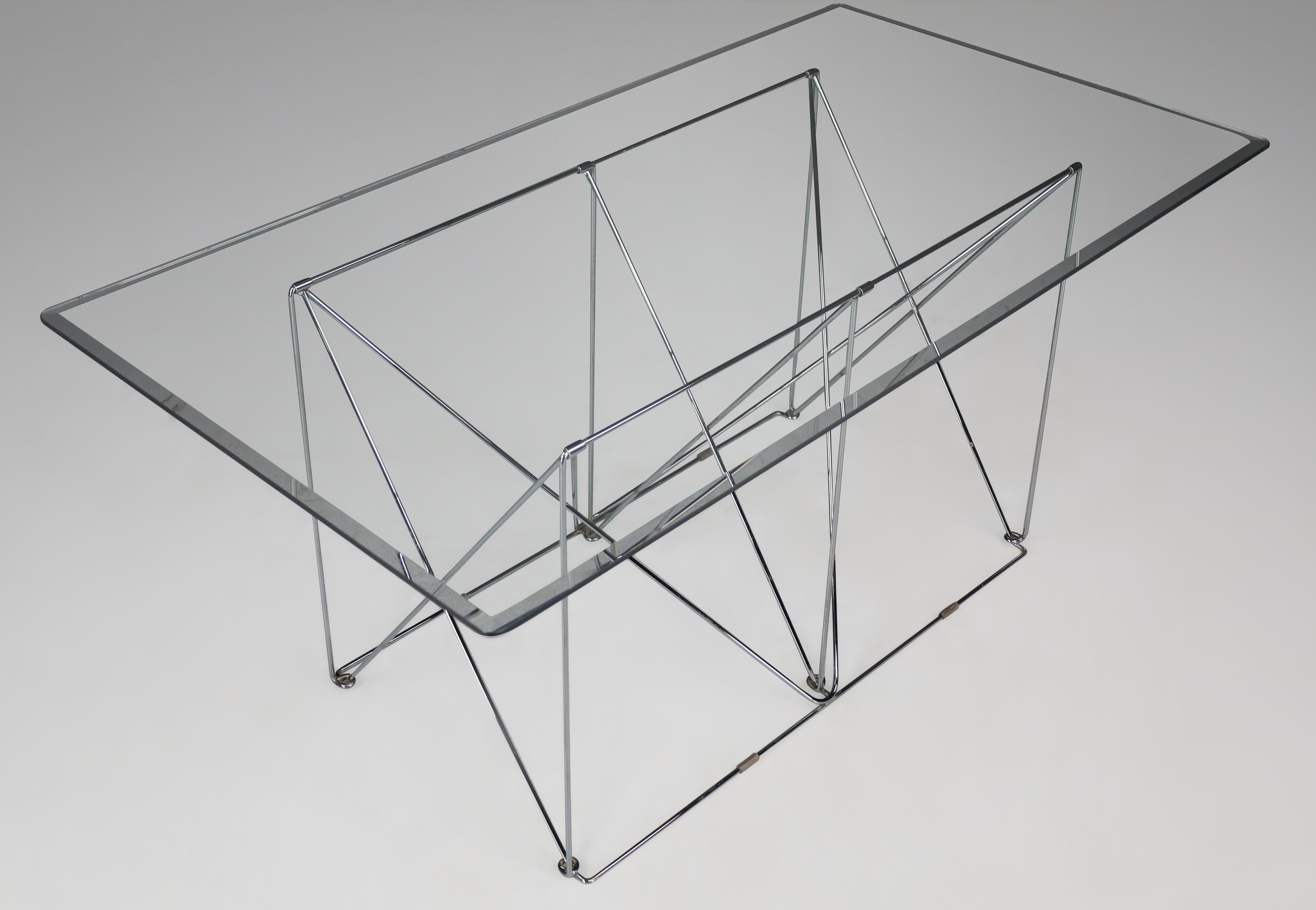 Max Sauze Modern Architectural Folding Metal Table or Desk, France, 1970s

Max Sauze designed this elegant foldable chromed steel table with a floating glass top circa 1970 France. This table made of chromed steel will surely add an element of a