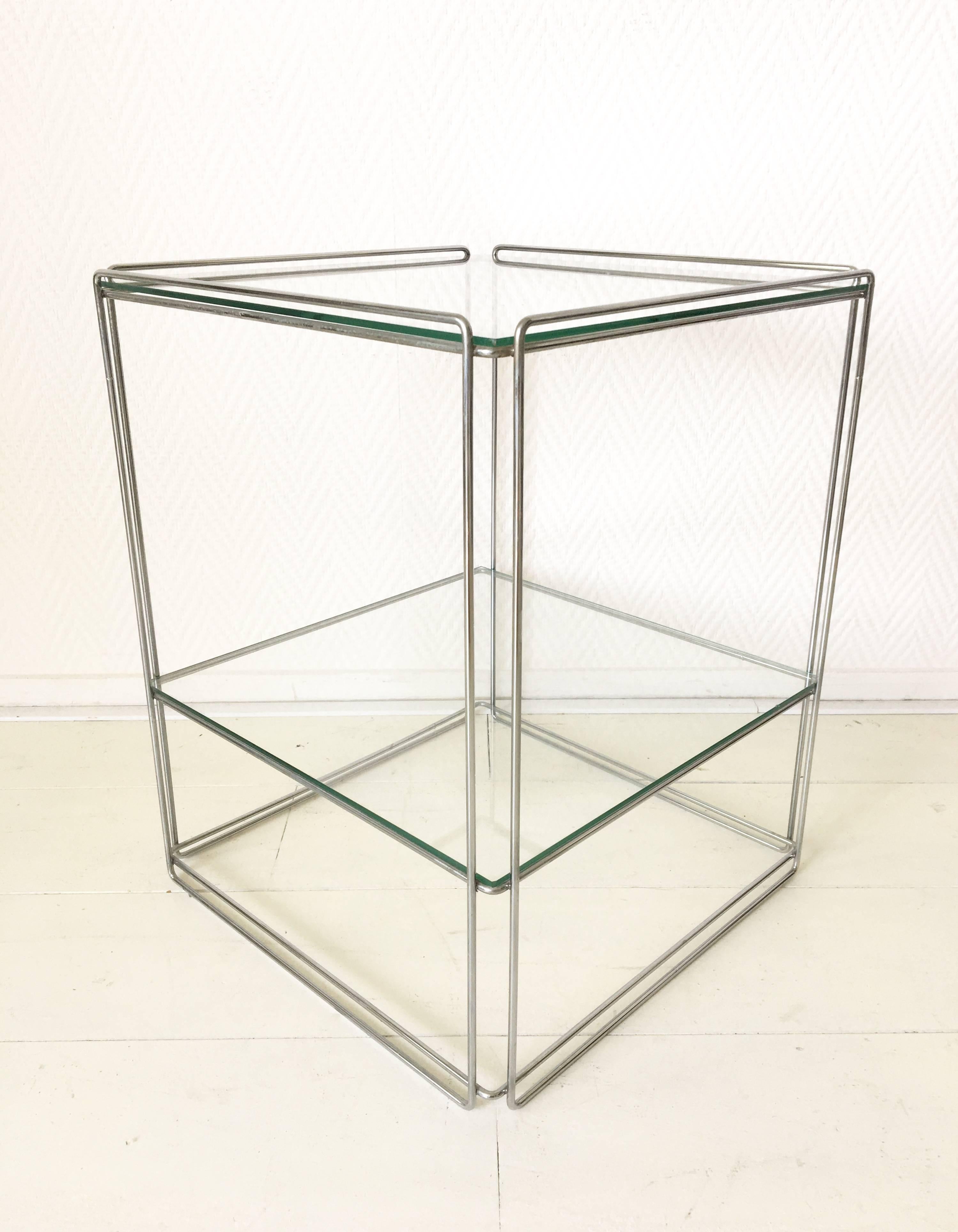 Beautiful minimalist design by Max Sauze for Max Sauze Studio, circa 1960s. This table features a silver colored metal base and two glass 'shelves'. One of them had a very small chip of the glass which, luckily, is barely to be seen. Overall this