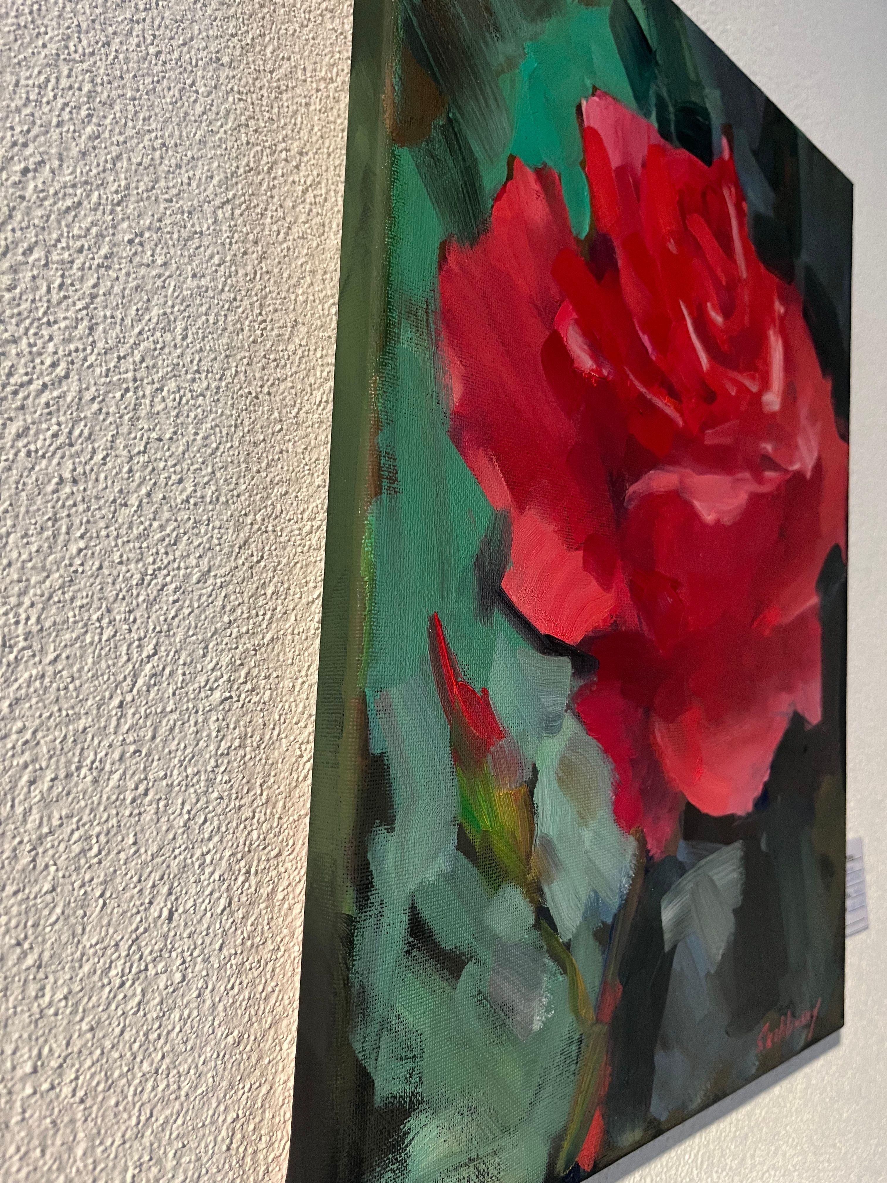 Zärtlichkeit ohne Grenzen


Im Herzen der Komposition blüht eine karminrote Blume, die vor Leben und Licht pulsiert. Ihre Blütenblätter entfalten sich wie Flammenzungen, selbstbewusst und verletzlich zugleich. Sie ist nicht nur eine Rose - sie ist