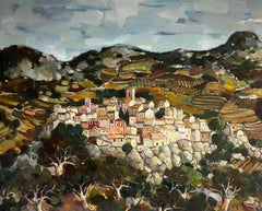 Un pueblo en lo alto de una colina entre colinas y terrazas rocosas Paisaje de cielo nublado