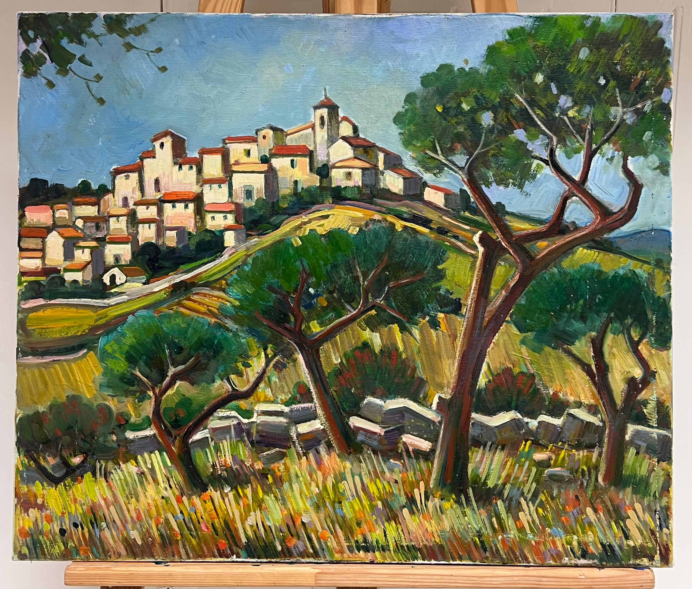 Incantevole villaggio in cima alla collina con cipressi e prato di fiori selvatici Paesaggio ad olio - Painting di Max Toutain