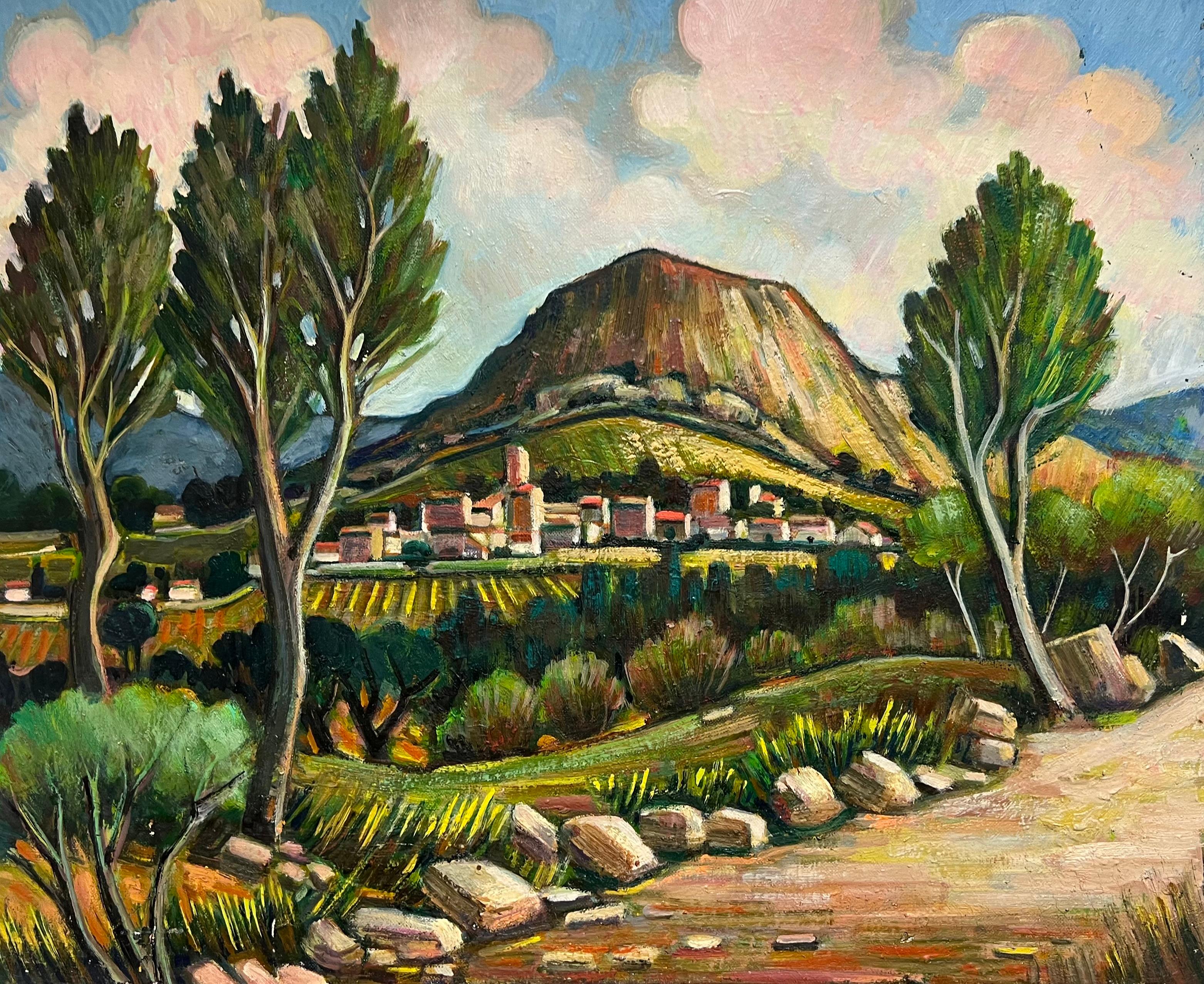 Landscape Painting di Max Toutain - Villaggio francese ai piedi di una montagna, sotto un cielo vibrante Olio francese