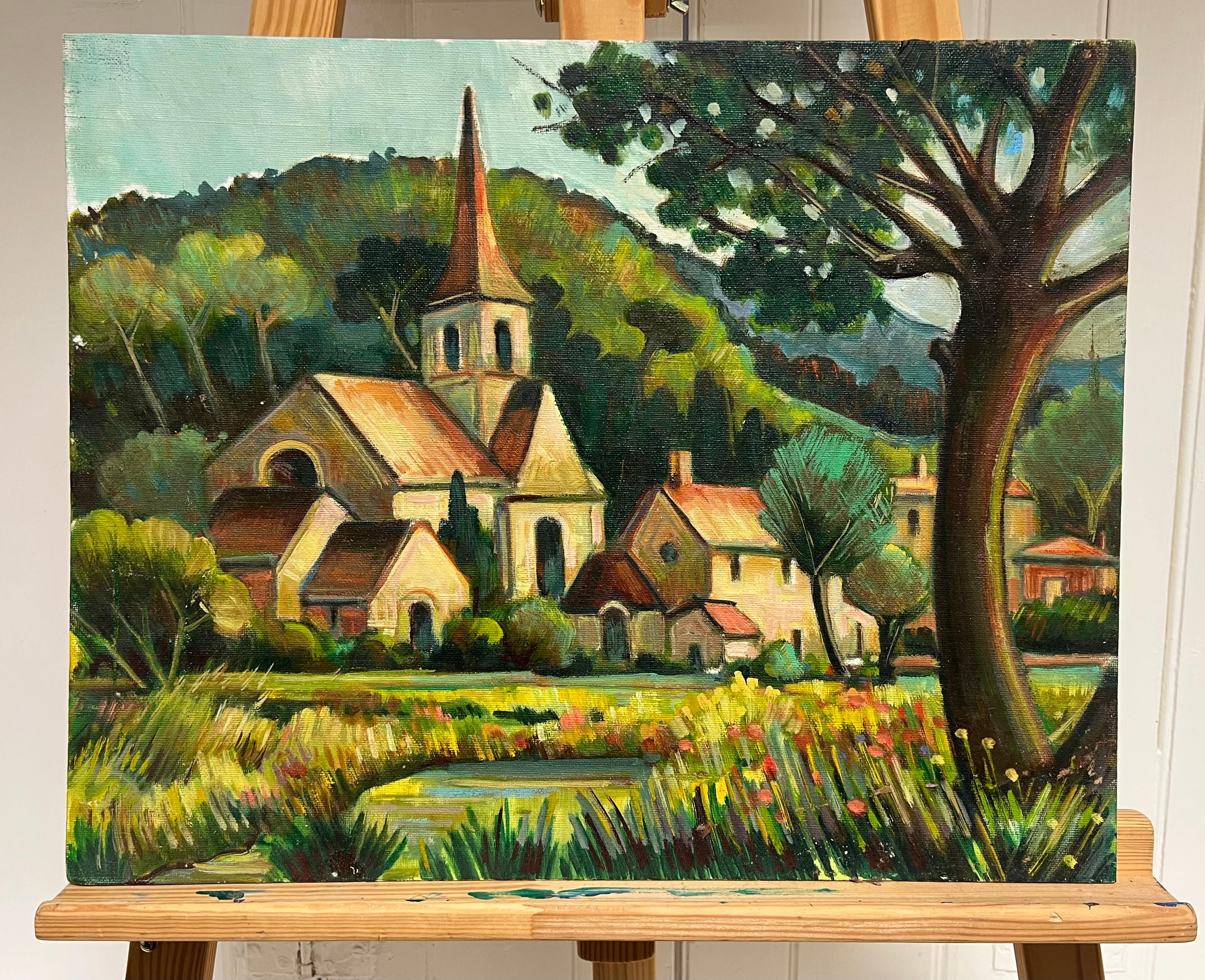 Pittoresca chiesa di paese immersa in un paesaggio francese di campagna lussureggiante - Painting di Max Toutain