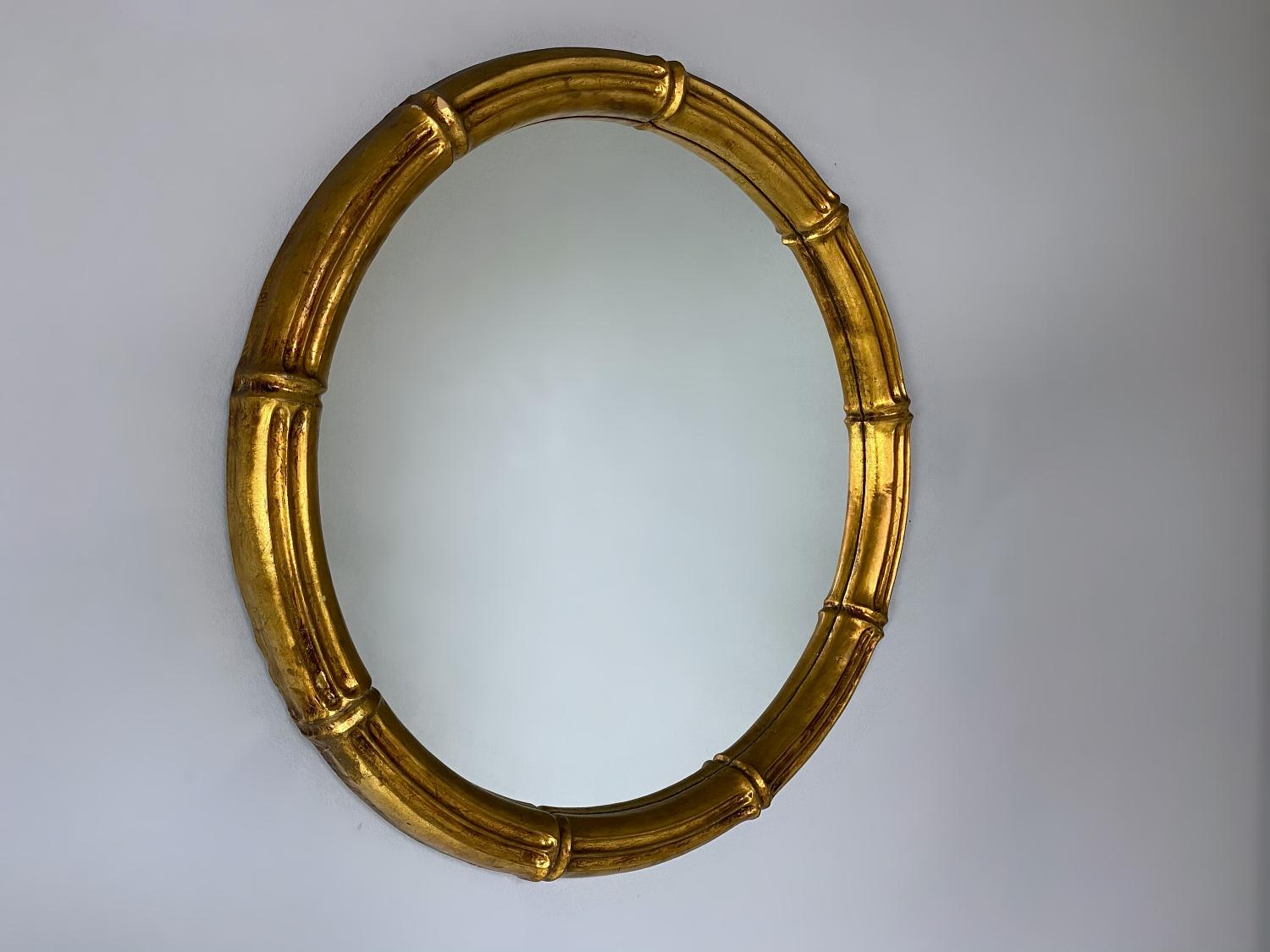 Sculptural, handcrafted giltwood faux bamboo round wall mirror made and labeled by Max Welz in the 1940s, Austria. The mirror is in very good condition.
We love to create the illusion of space and decorate any room in contemporary style with such a