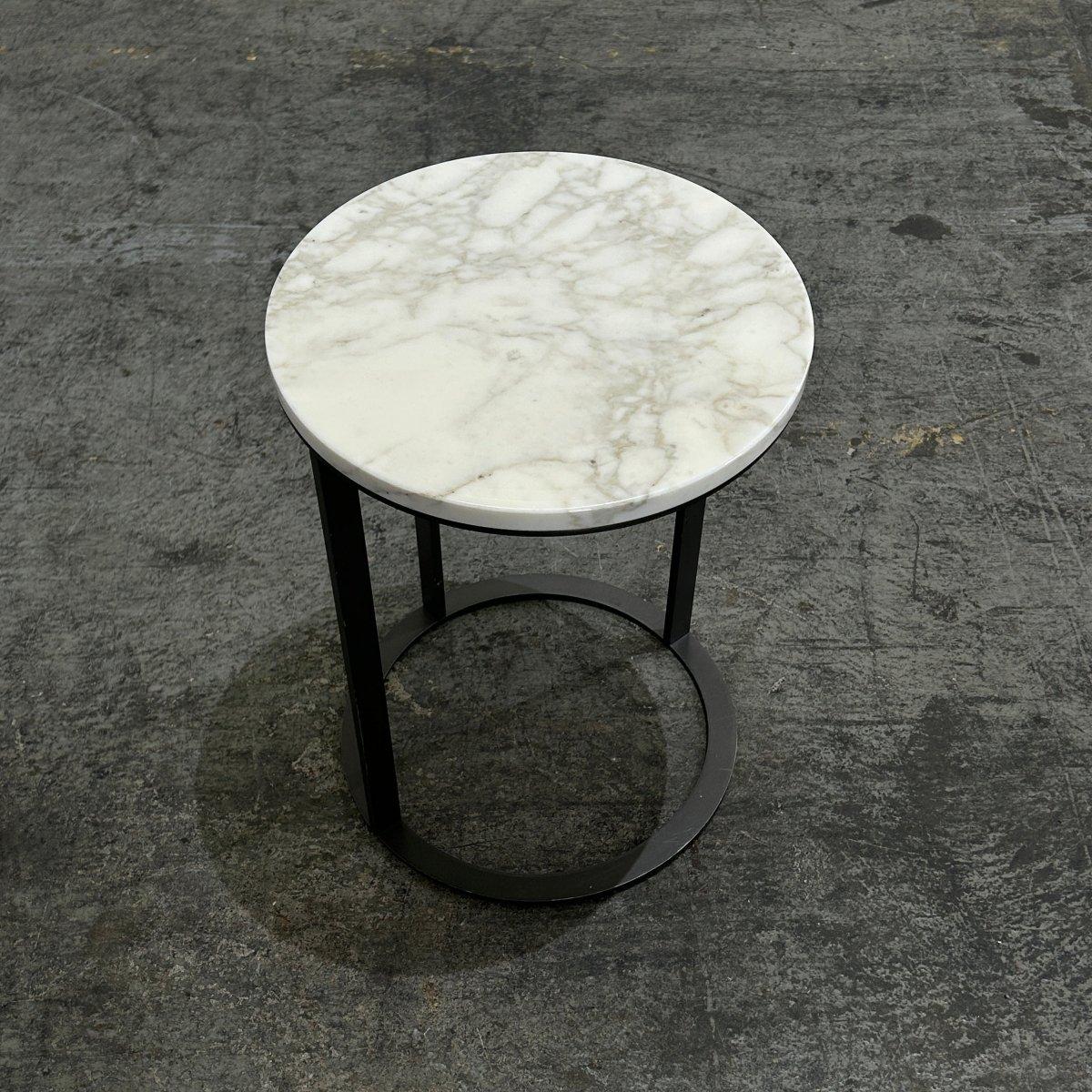 Introducing the Lithos Round Side Table by B&B Italia, a stunning addition to any modern living space. Crafted with the highest quality materials, this side table features a sleek round design with a luxurious top and a sturdy metal base. Its