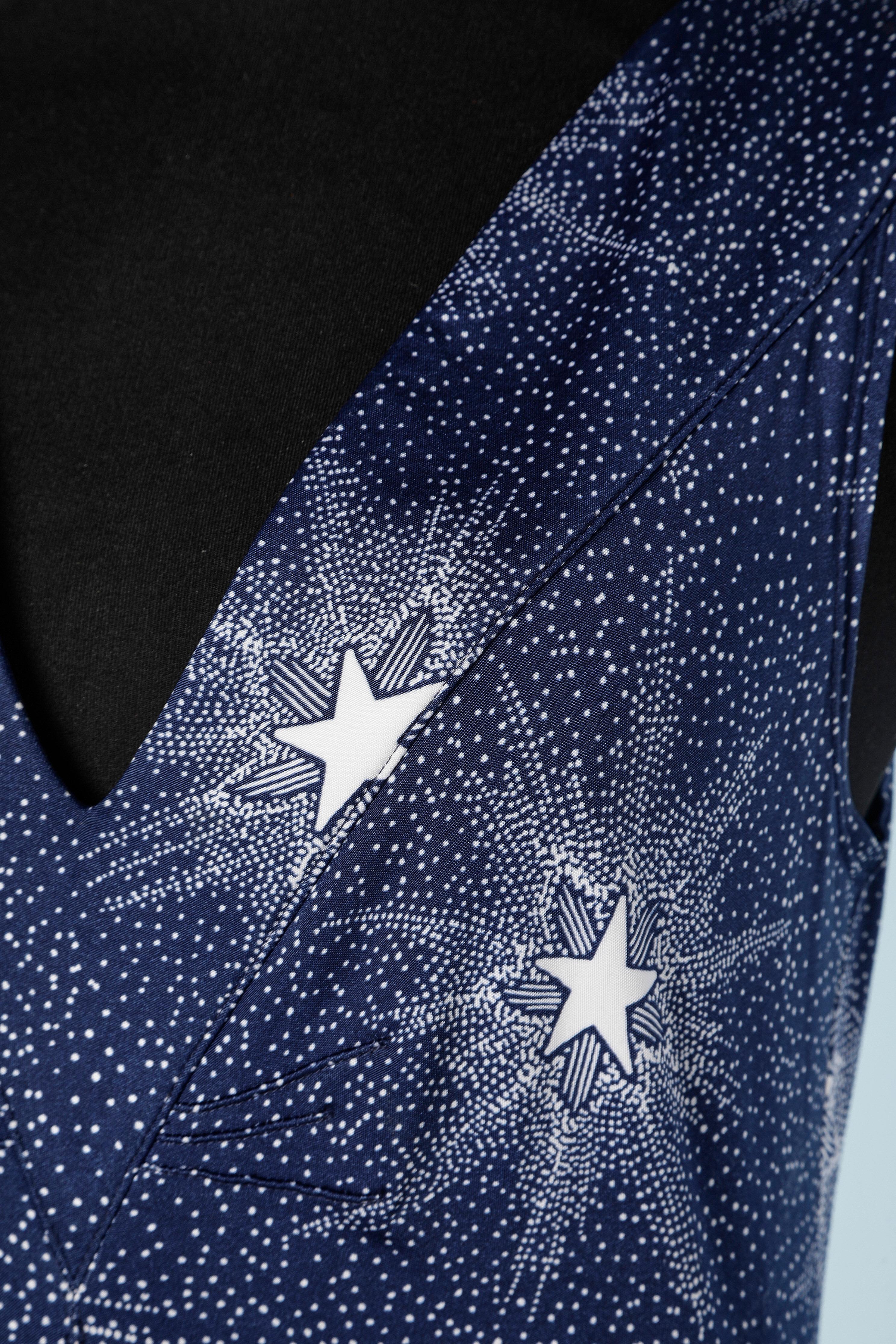 Maxi sleeveless dress with stars print. Fabric composition: 95% rayon, 5% elastane 
SIZE 40 (M ) 