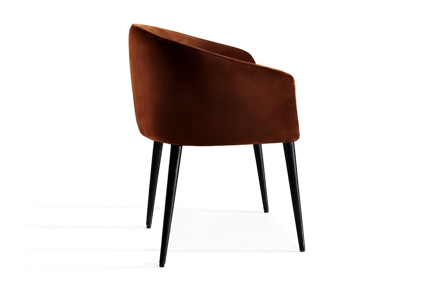 The Utopía Dining Chair brings boldness and imagination to the everyday. With its curved backrest and generous seat, it offers comfort without sacrificing personality. Its compact, sculptural silhouette fits seamlessly into dining rooms, workspaces,