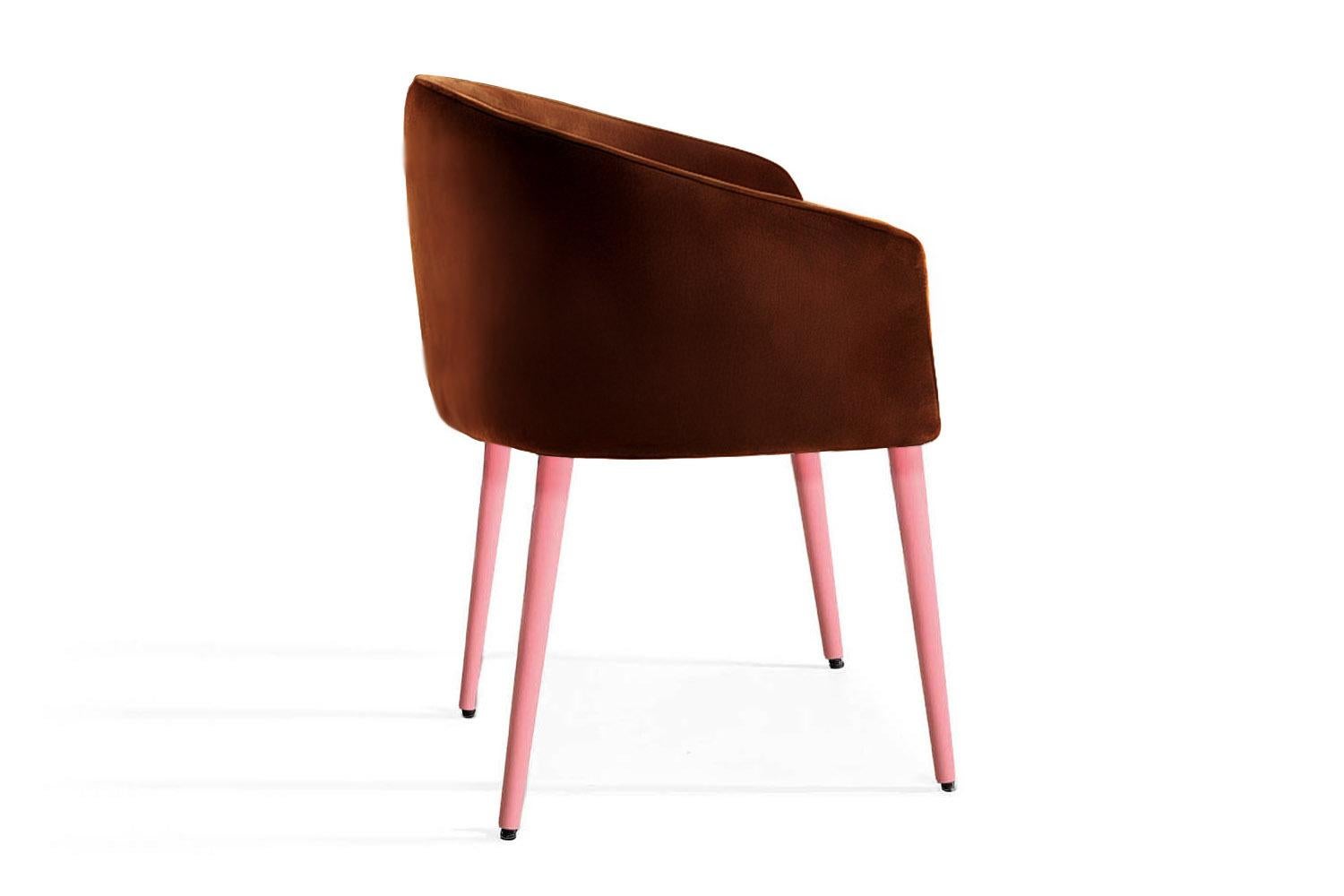 The Utopía Dining Chair brings boldness and imagination to the everyday. With its curved backrest and generous seat, it offers comfort without sacrificing personality. Its compact, sculptural silhouette fits seamlessly into dining rooms, workspaces,
