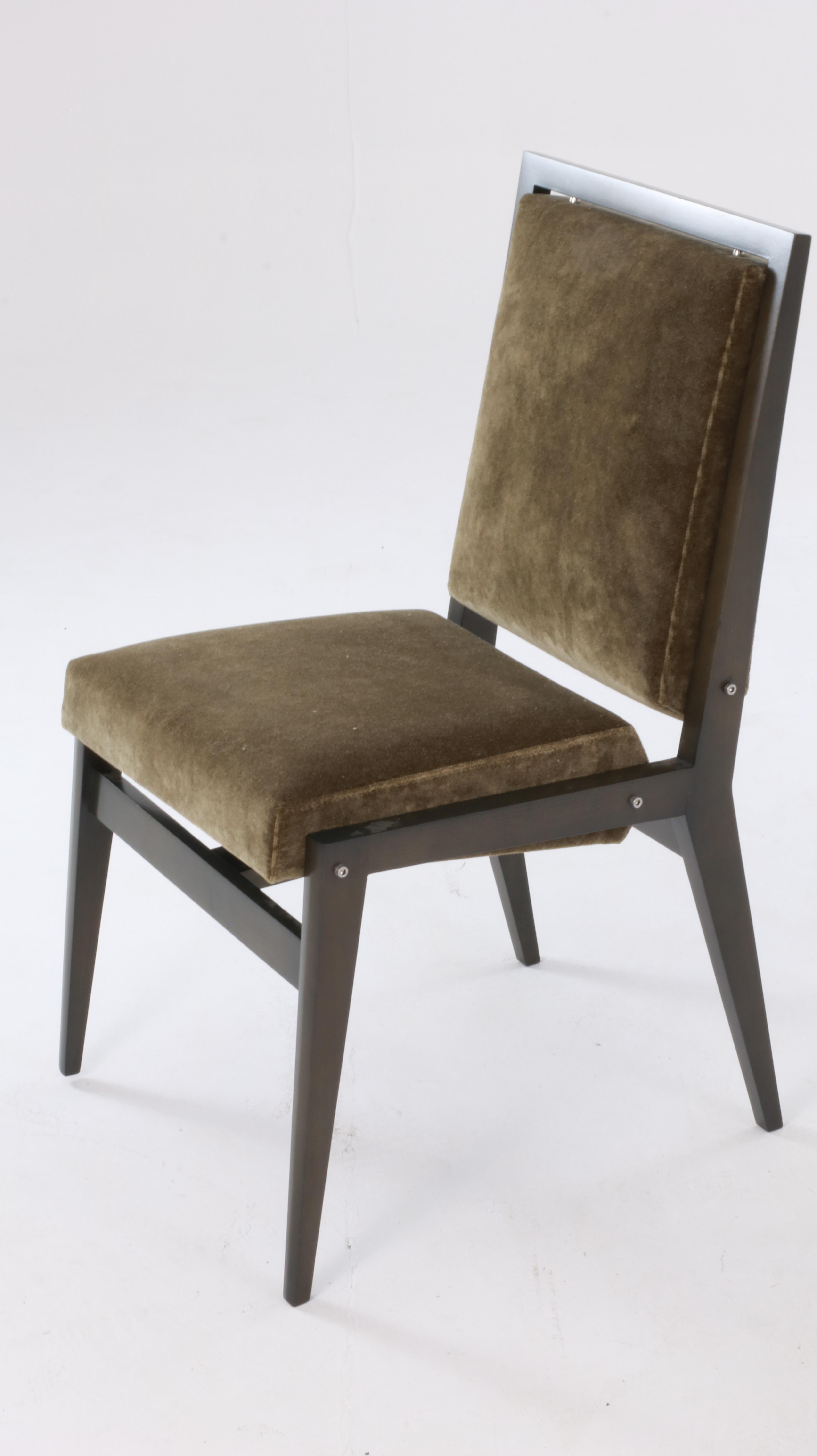 Council chair by Maxime Old, a contemporary  edition by the Anne Jacquemin Sablon gallery. The base of this chair with salient angles is in oak, the backrest and seat are covered with fabric. The chair was designed for the City Hall of Rouen in