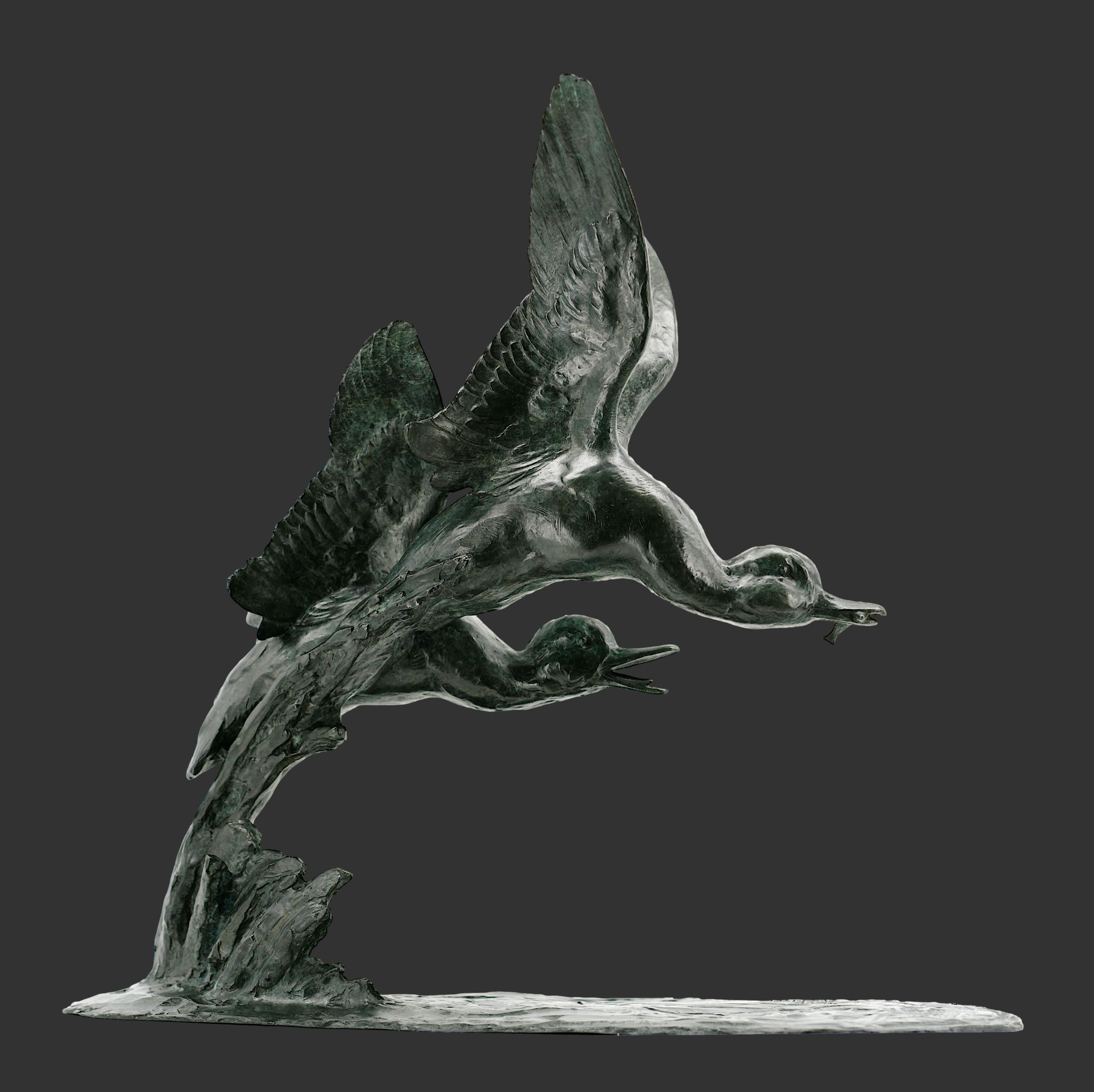 Couple of ducks flying on ocean waves by Maximilien FIOT (1886-1953), France, 1910s. Lost wax bronze - Double Rodin patina (black tinged with green). Here is the famous and rare sculpture of ducks taking flight on the waves of the ocean by