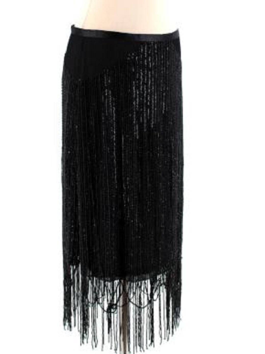 MaxMara Black Sequin Tassel Skirt 

- Low waisted 
- Side popper and button fastening 
- Sequin, tassel detailing 
- Mesh fabric 
- Mid-length 

Materials:
- 35% Virgin Wool
- 35% Cotton
- 25% Viscose 
- 5% Elastane 

Dry clean only 

Made in Italy