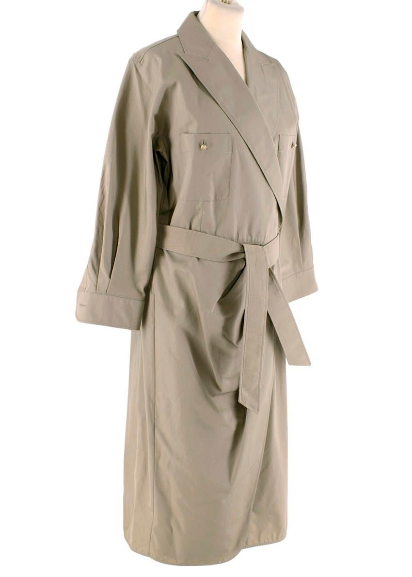 MaxMara Stone Poplin Cotton Wrap Trench Dress
 

 - Cotton poplin trench-style wrap dress
 - Collared, wrap front, with single popper closure
 - Self-tie waist belt
 - Gold-tone hardware
 - Two chest patch pockets with button finish
 

 Materials:
