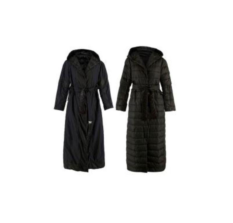 MaxMara Long Black Reversible Jacket

- Reversible
- Button fastening
- Belt fastening
- Adjustable waist
- Removable sleeves with button fastening
- Two pockets on both interior and exterior
- Hooded
- Quilted body on one side
- Plain body on one