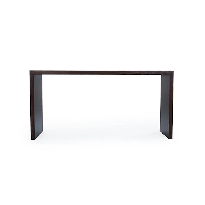 The Maxwell's stunning wood frame and designer silhouette lends the collection a natural and sophisticated beauty that complements its angular, modern shape. This consoles offers stainless steel inlay, in brass or nickel finish, on both the top and