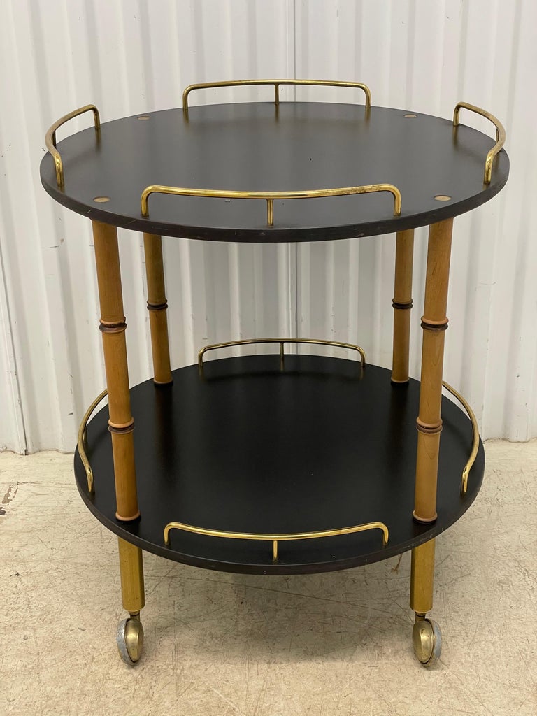 Rare Maxwell Phillips round bar cart server. Black with Faux bamboo legs and brass rail gallery. 1970's.