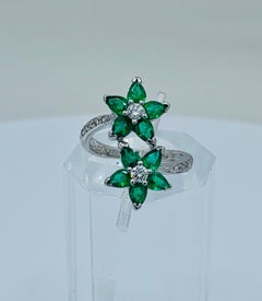 Vivid Green Emerald and Diamond 18 Karat White Gold Double Flower Ring