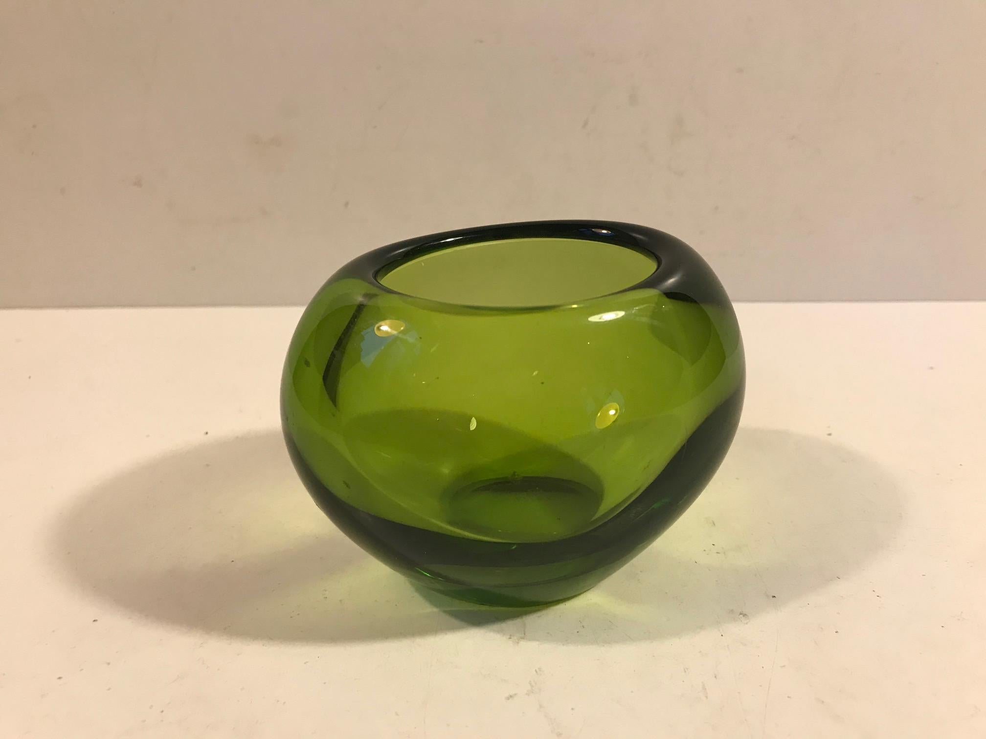 A 1950s Holmegaard Per Lutken 'May' green heart shaped vase, signed to base 'Holmegaard', numbered and with Per Lütken initials.