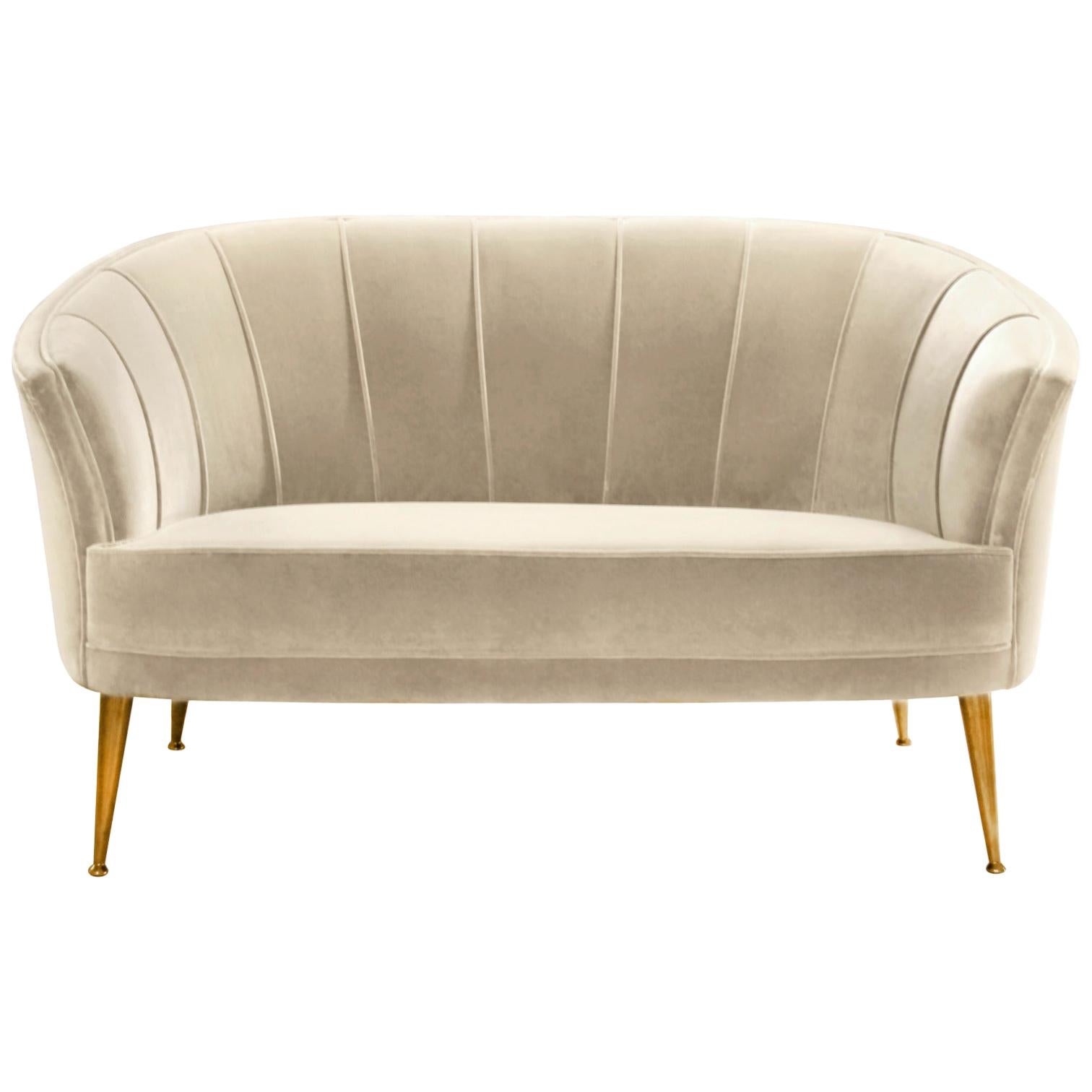 The Maya civilization had maize as one of the primary elements of their culture. Personified as a woman, Maya’s Maize God was the inspiration behind Maya Upholstered Sofa. With legs in matte aged brass, this velvet sofa has the sensual and delicate