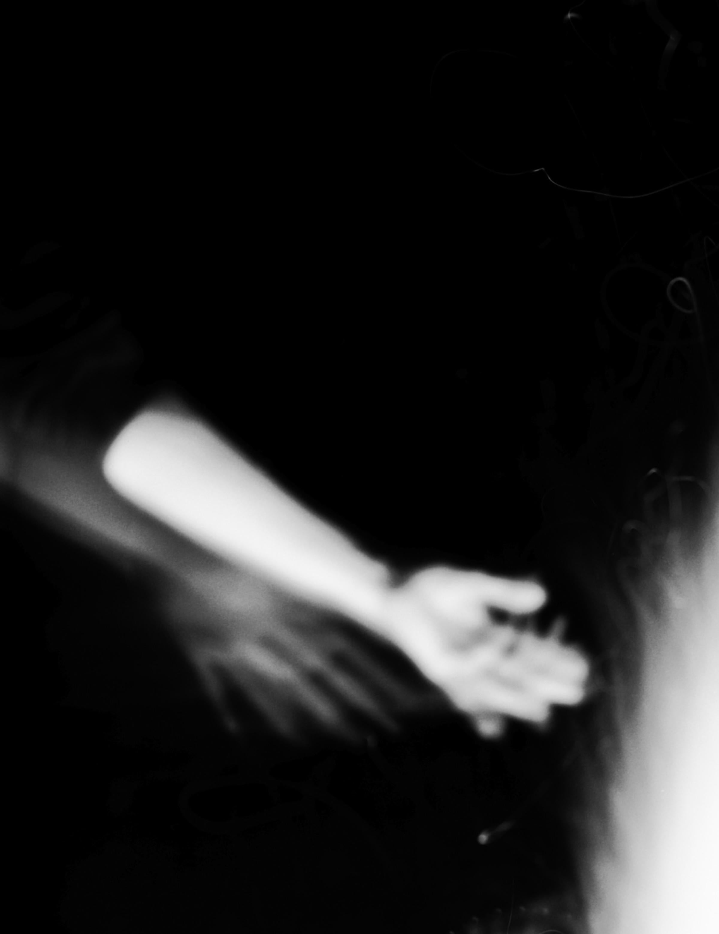 Ancestral Memory - Black and White Archival Inkjet Print Fire Flames Hands, 2024 - Photograph by Maya Tihtiyas Attean