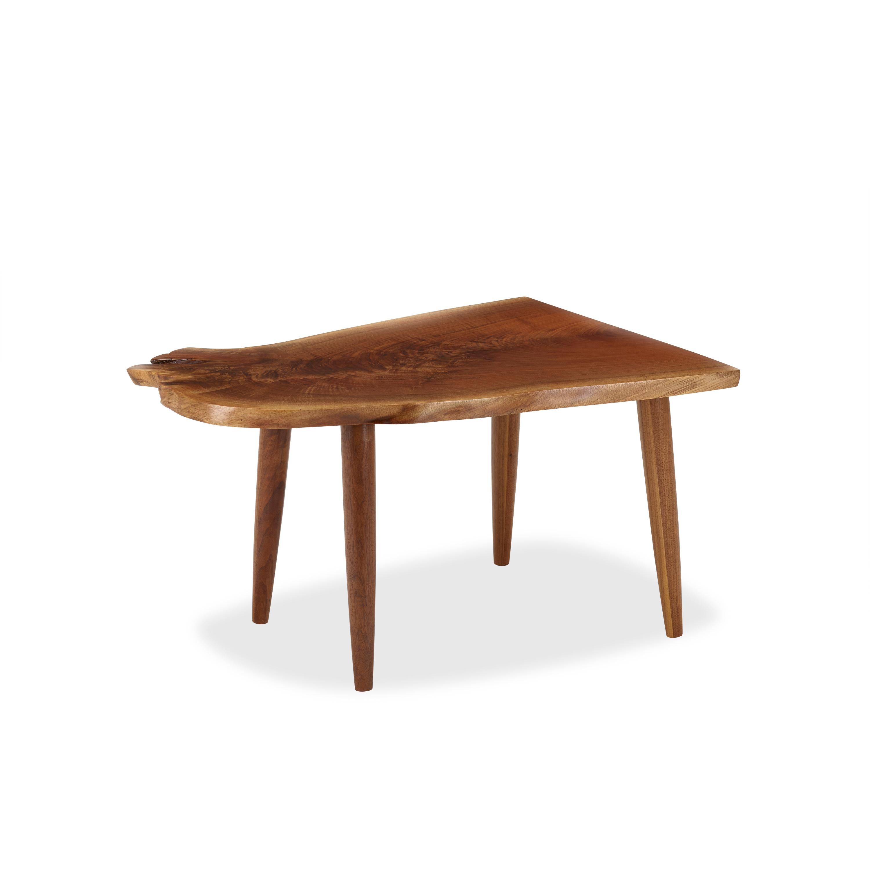 Beautifully figured claro walnut slab with turned walnut legs.
Michael Oates (b. 1991) is an artist and designer based out of Alpha, Nj. Who's current discipline has been functional and spatial design using wood as his primary medium.
Living and