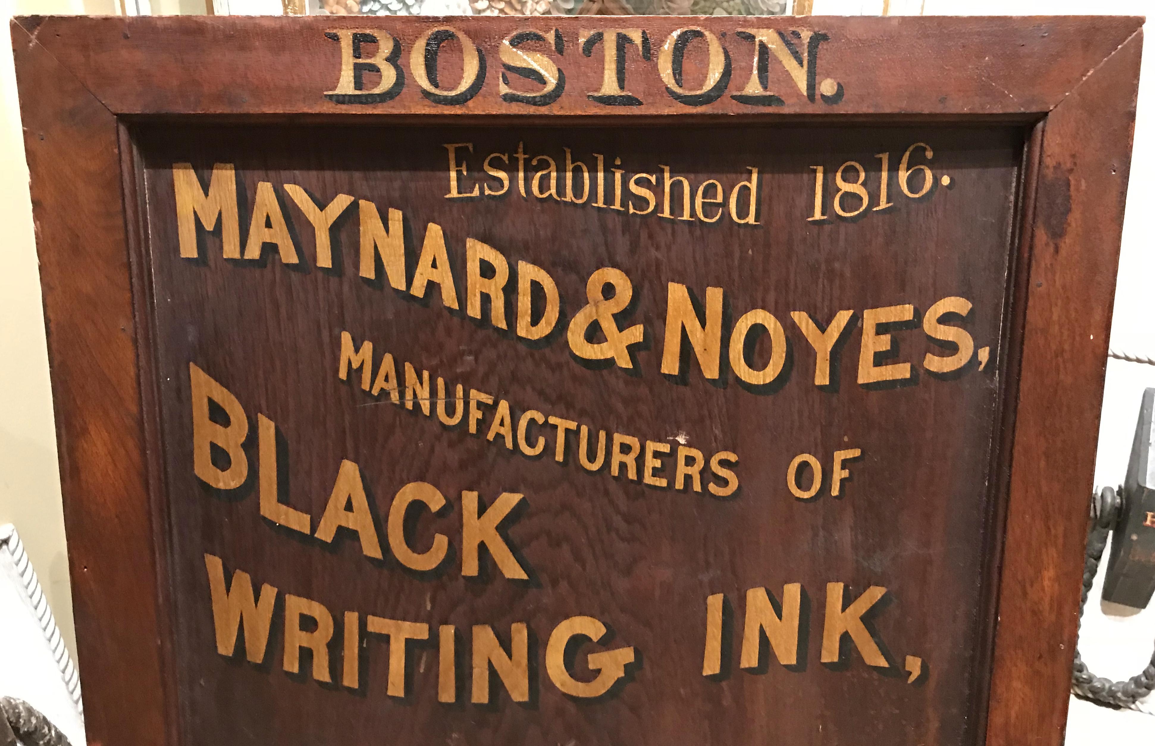 A fine hand painted poplar or oak wooden sign with wooden frame for Maynard & Noyes Ink Company, Boston, Massachusetts, which reads “Boston, Established 1816, Maynard & Noyes, Manufacturers of Black Writing Ink, Copying and Writing Ink, Carmine,