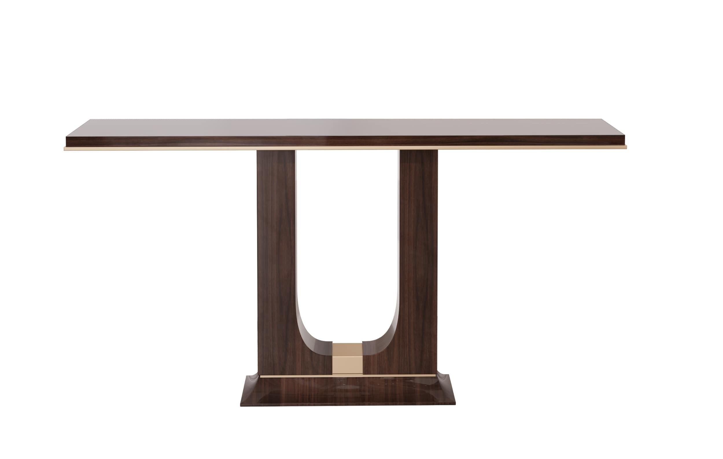 The Maynor Console Table brings refined elegance to any interior featuring a striking U-shaped pedestal base accented with gold details that add a touch of modern sophistication. Its slim and elongated design makes it perfect for entryways,