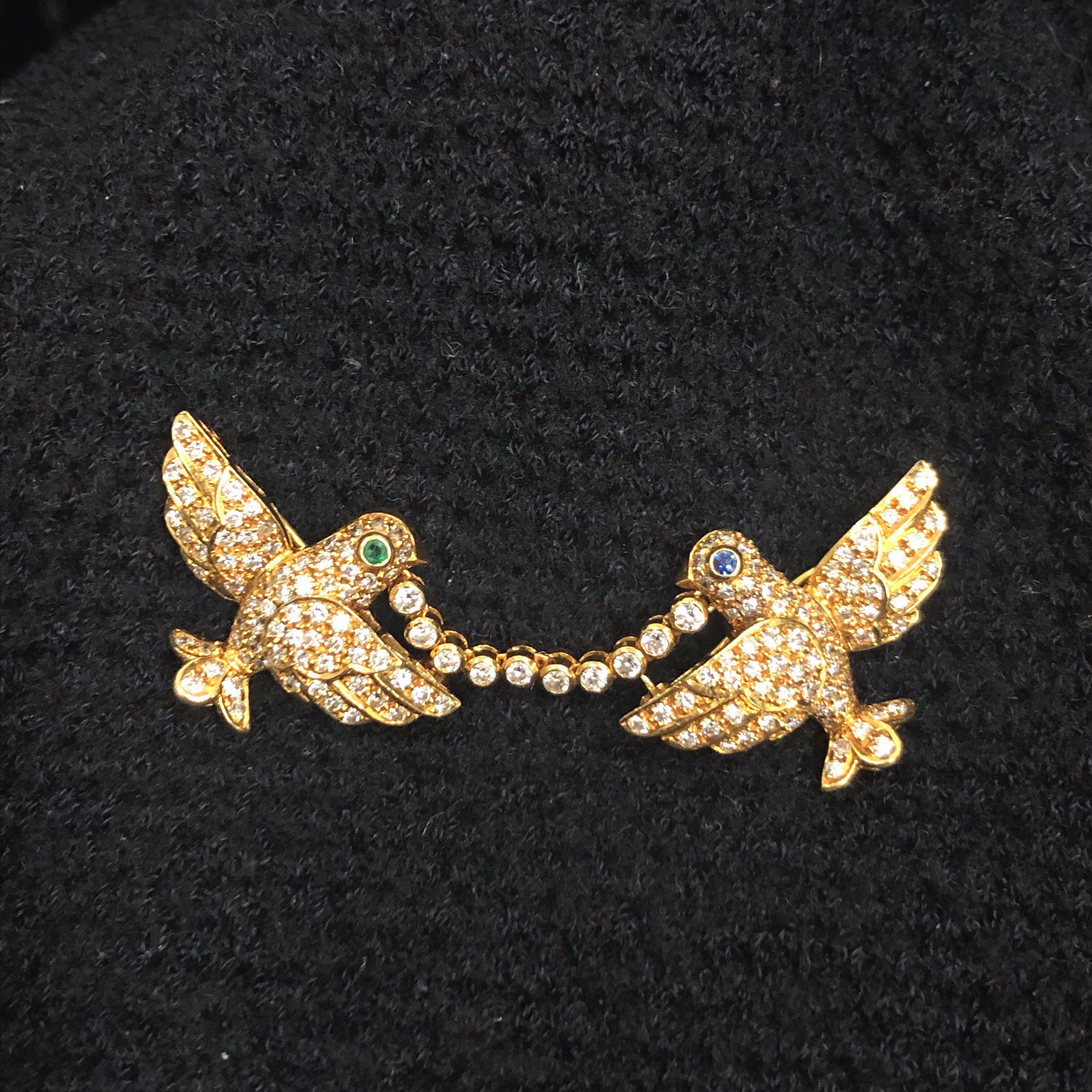 Mayor's Vintage 18k Yellow Gold 1cttw Diamond Emerald Sapphire Birds Brooch

Condition:  Excellent Condition
Metal:  18k Gold (Marked, and Professionally Tested)
Diamonds:  Round Brilliant Diamonds 1cttw
Diamond Color and Clarity:  F-G and