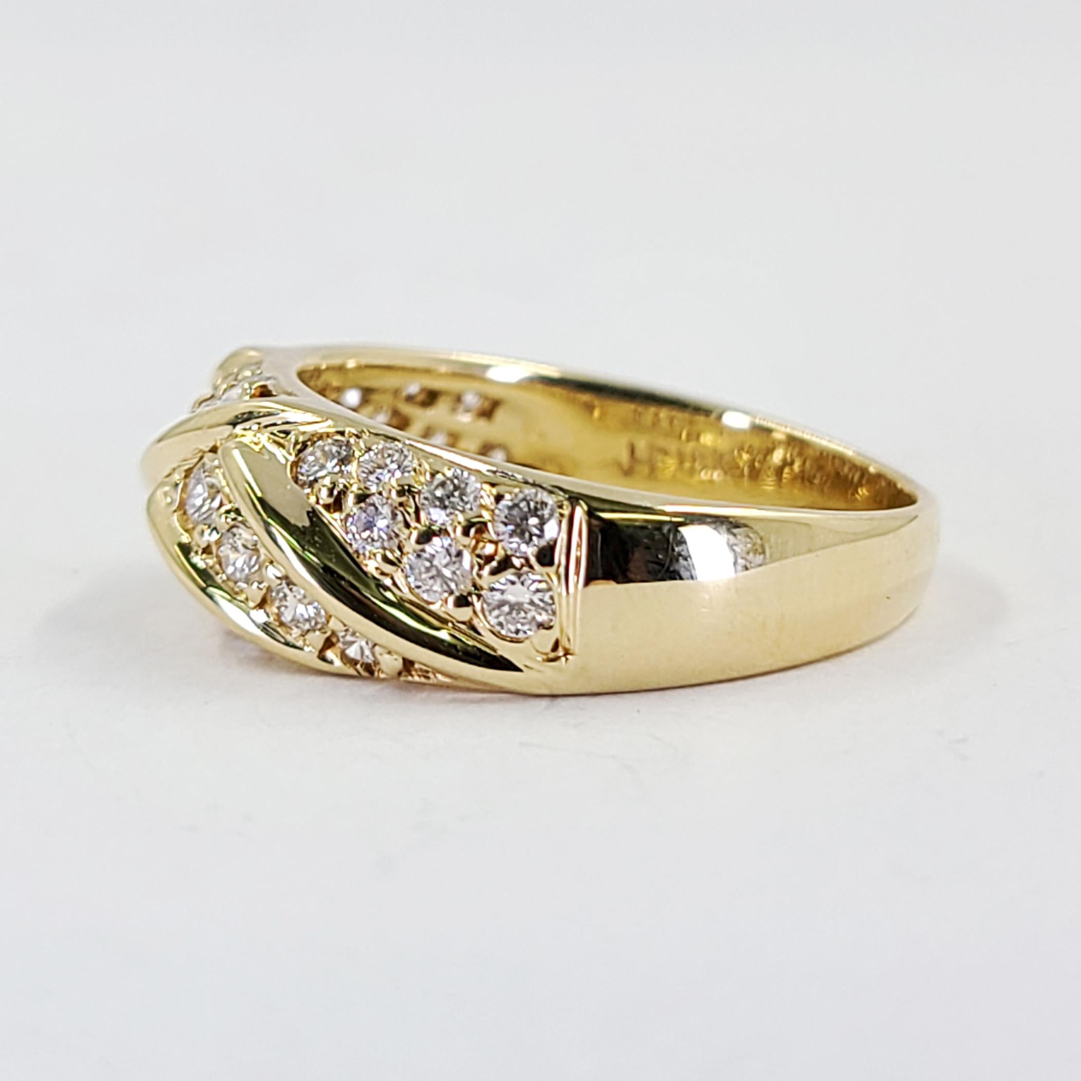 Mayor's 18 Karat Yellow Gold Domed Band Featuring 32 Round Brilliant Cut Diamonds Of VS Clarity & G/H Color Totaling Approximately 1.00 Carat. Finger Size 7; Purchase Includes One Sizing Service. Finished Weight Is 5.2 Grams.
