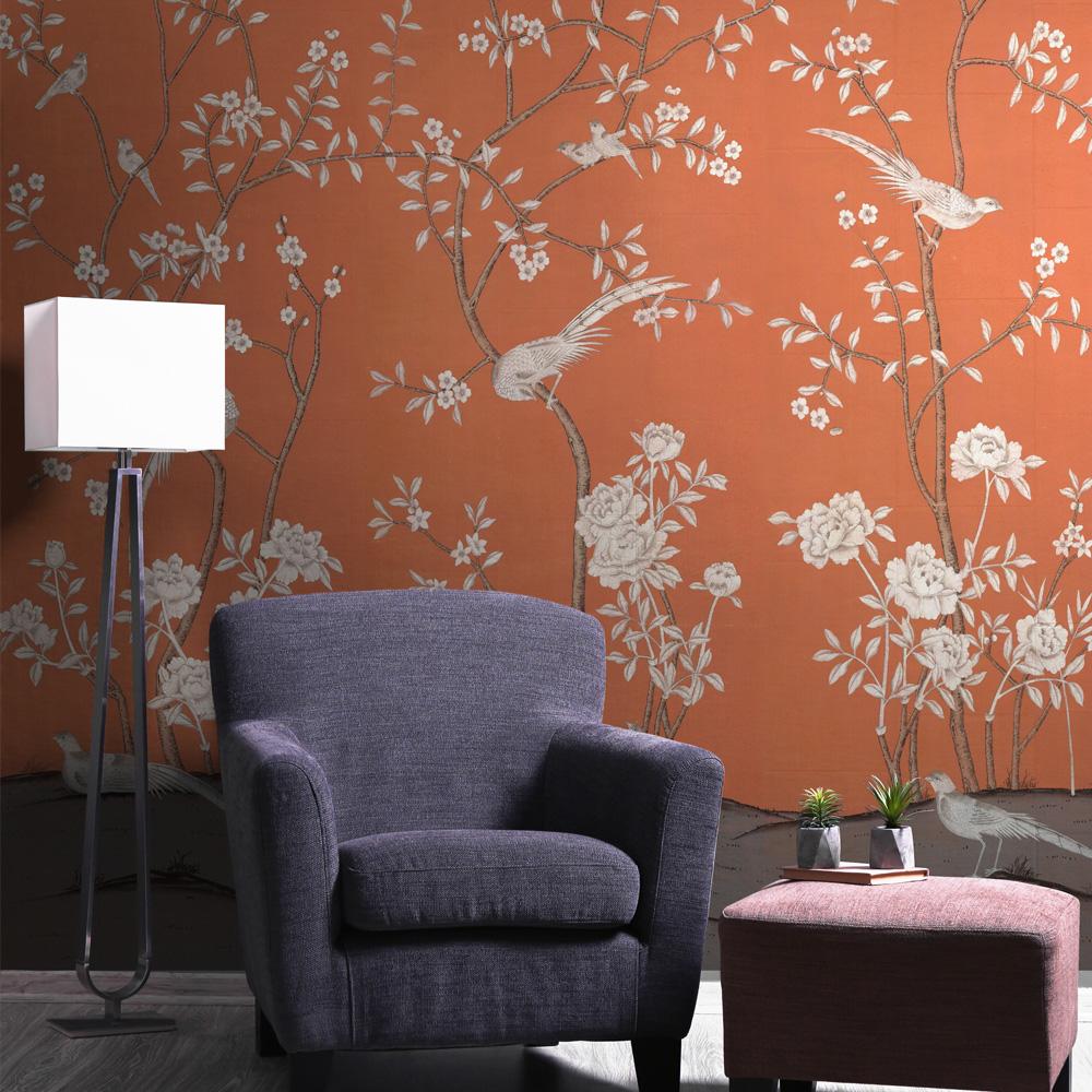 The Maysong Paris Chinoiserie mural is a stunning wallpaper pattern making a modern statement using classic styles with monochromatic large blooms and birds placed against a bold orange background. This mural wallpaper features 3 panels before the