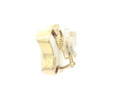 Boucles d'oreilles à clip en or jaune 14k avec perles baroques en forme de "X".