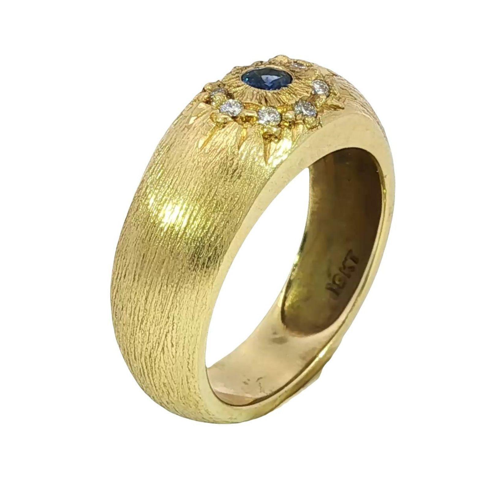 MAZ 18K Diamond Starburst Ring Sapphire Center Florentine Matted Yellow Gold

Made in 18k yellow gold, this band ring features a 0.08ct central blue sapphire framed by 0.08ctw round white diamonds. The sapphire’s deep blue hue contrasts beautifully
