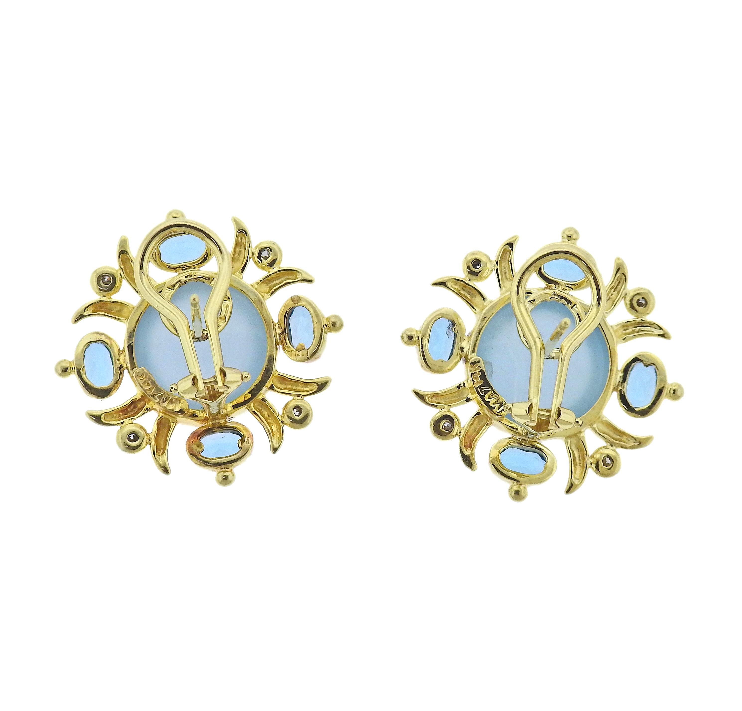 Brand new 14k gold Maz earrings with 0.20ctw H/VS diamonds, moonstones and blue topaz. Earrings are 25mm x 25mm. Weight - 11.2 grams. Marked: MAZ, 14k.