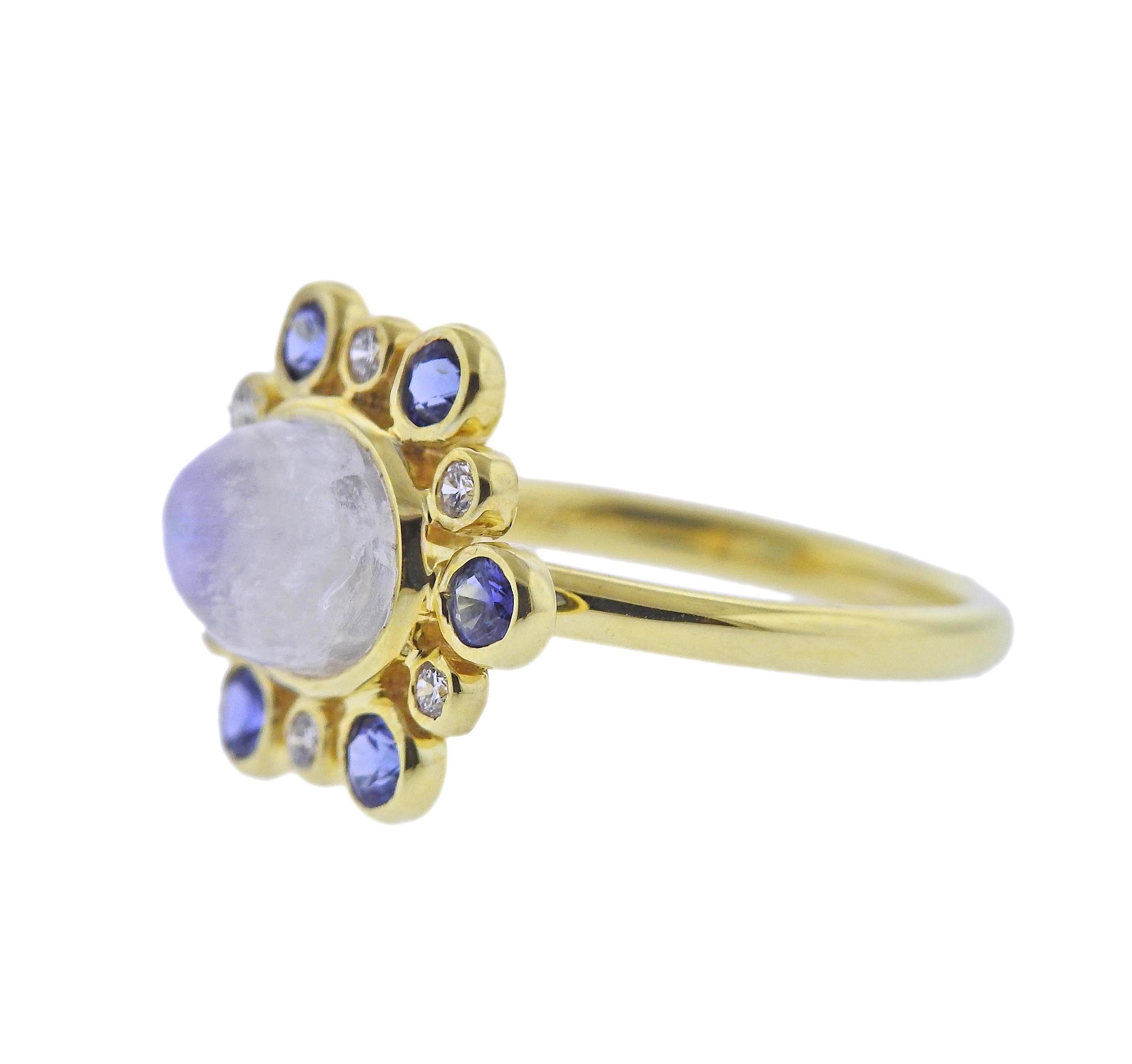 Brand new 14k gold Maz ring, with 0.12ctw H/VS diamonds, Moonstone and sapphires. Ring size 7, top is 15mm x 18mm. Weight - 3.7 grams. Marked: MAZ, 14k.