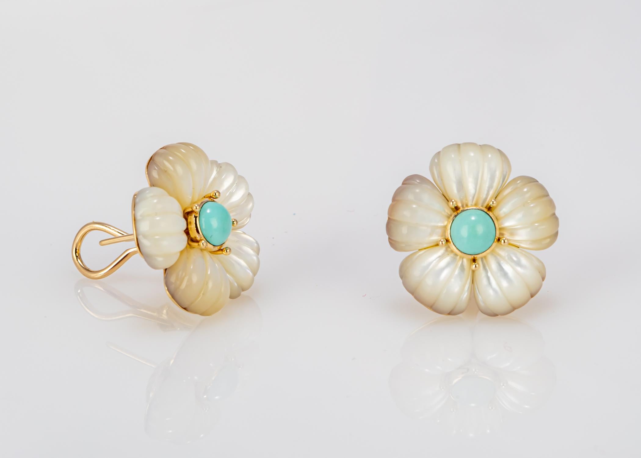 MAZ is known for designs that celebrate beautifully carved stones. The mother of pearl petals and accented with bright turquoise centers. At 1 inch in size this chic pair of earrings will go from daytime to evening.