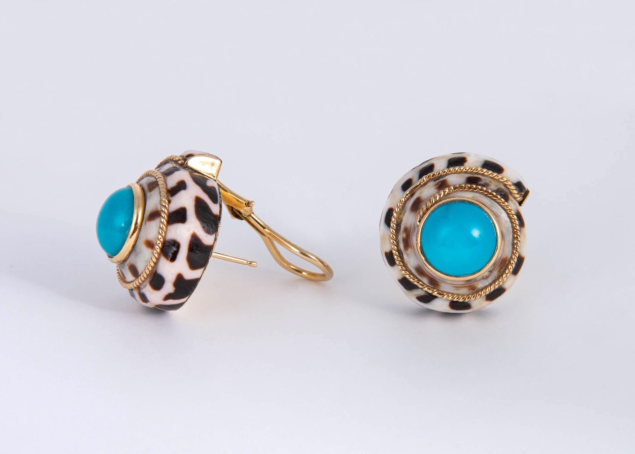 MAZ is famous for there beautiful shell earrings. This pair features a wonderful brown and white shell paired with rich turquoise centers. 7/8's of an inch. Wearable and Chic !!!